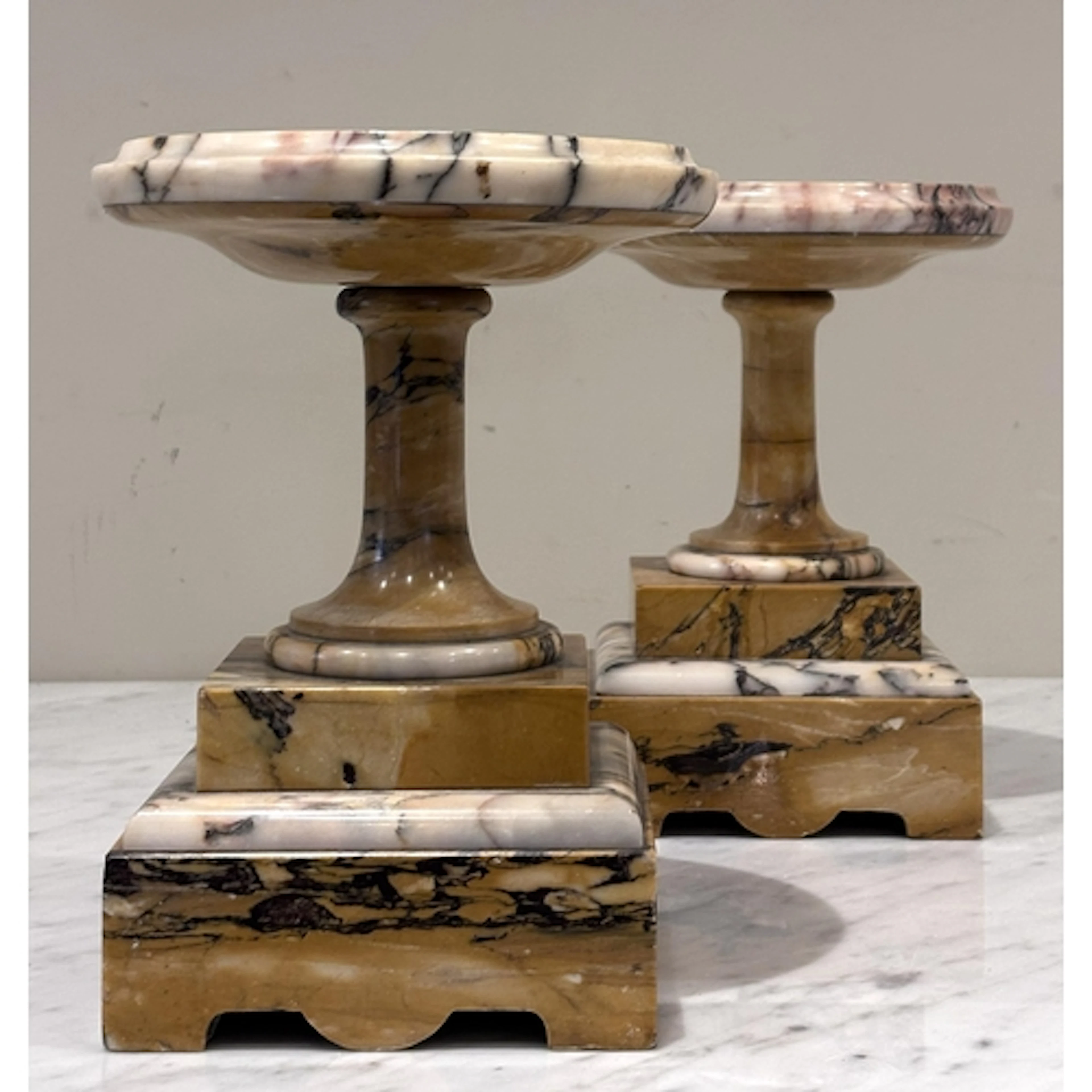 A pair of Neo-classical style 'Grand Tour' yellow Sienna mar...