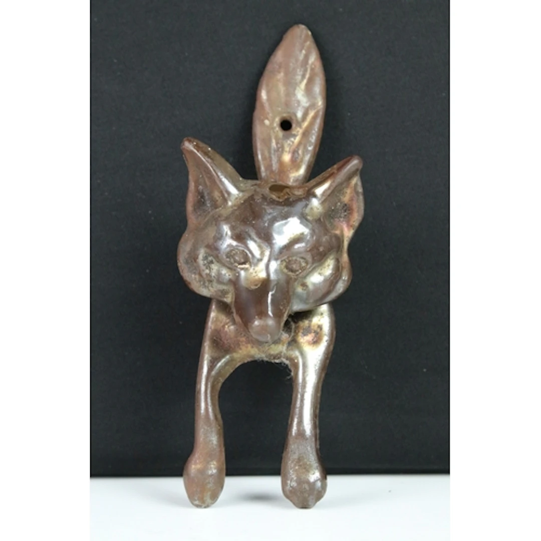Early 20th century cast metal fox door knocker having a lust...