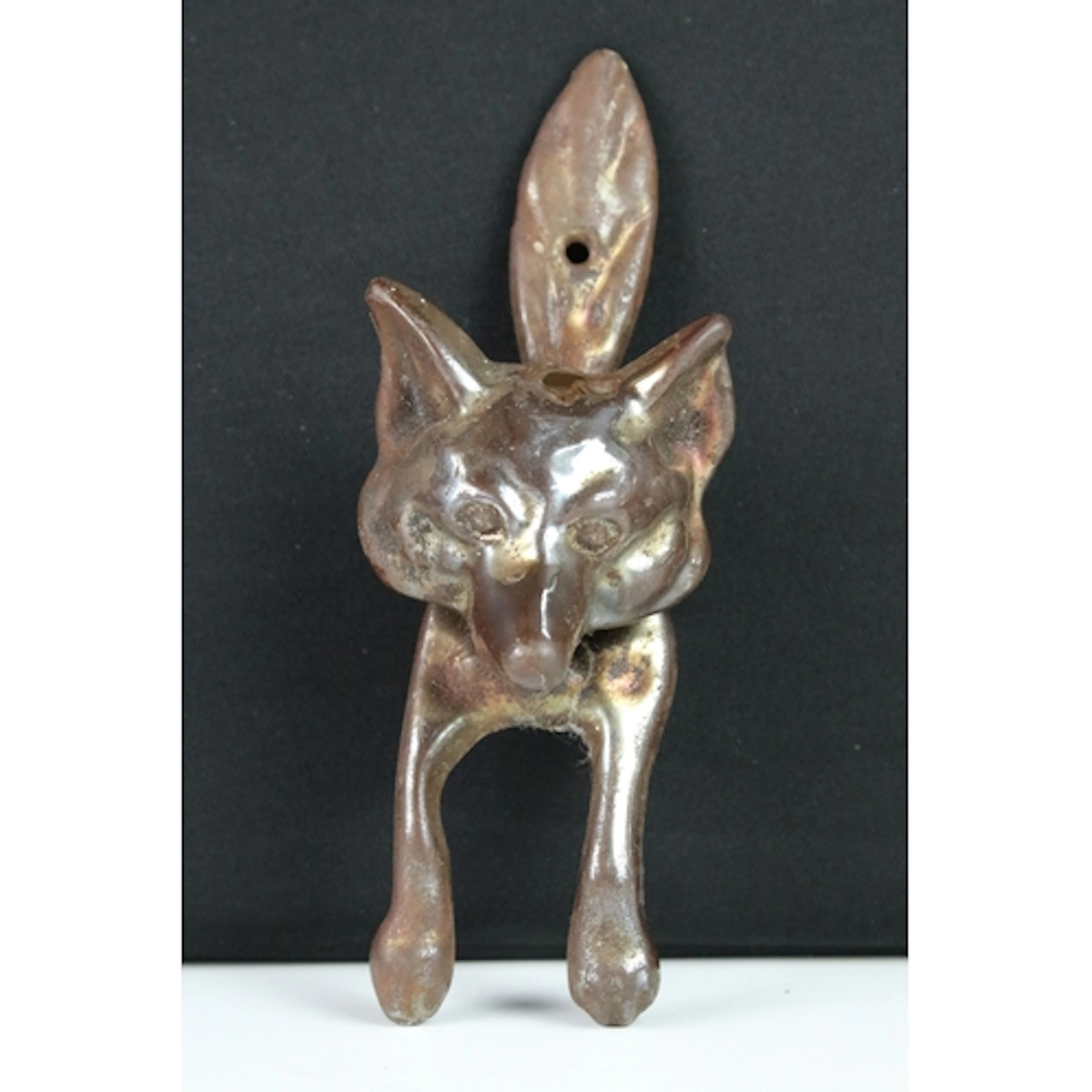 Early 20th century cast metal fox door knocker having a lust...