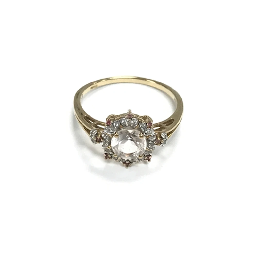 A 9ct yellow gold ring set with white stones and small pink ...