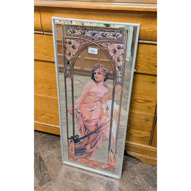 An Art Nouveau style decorative wall mirror