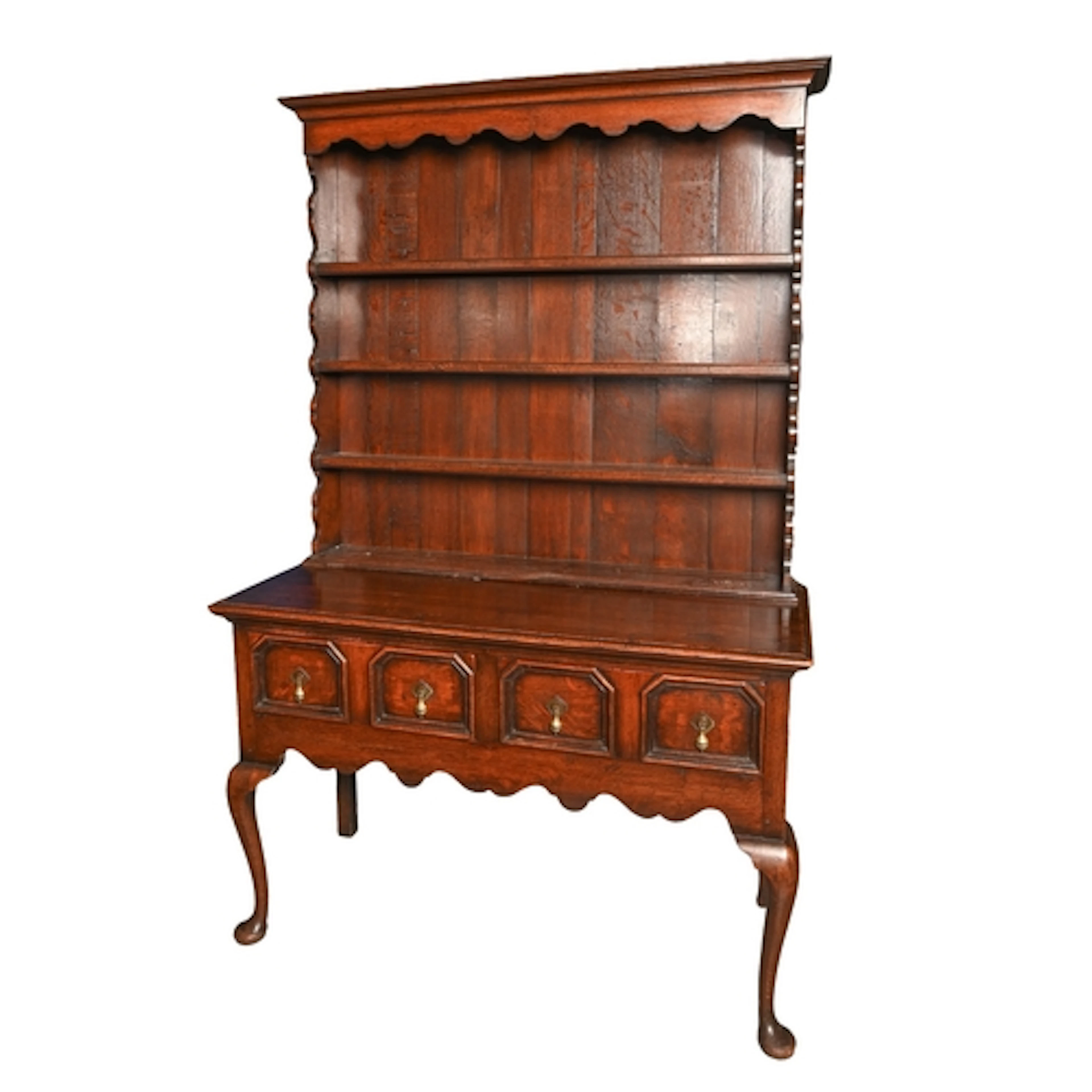 A George III oak dresser, the base with panelled sides, geom...