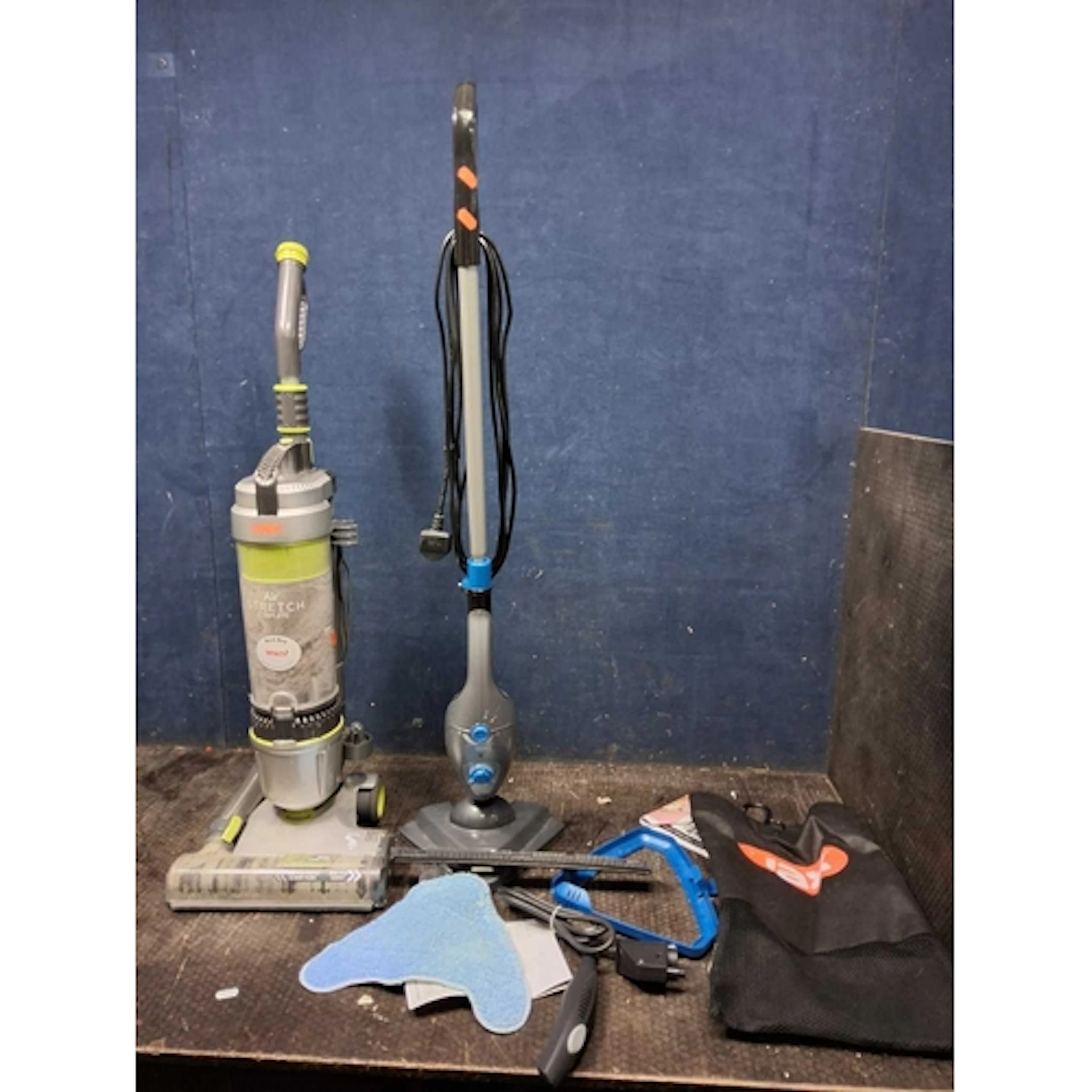 A VAX AIR STRETCH COMPLETE VACUUM CLEANER and a Vax Steam mo...