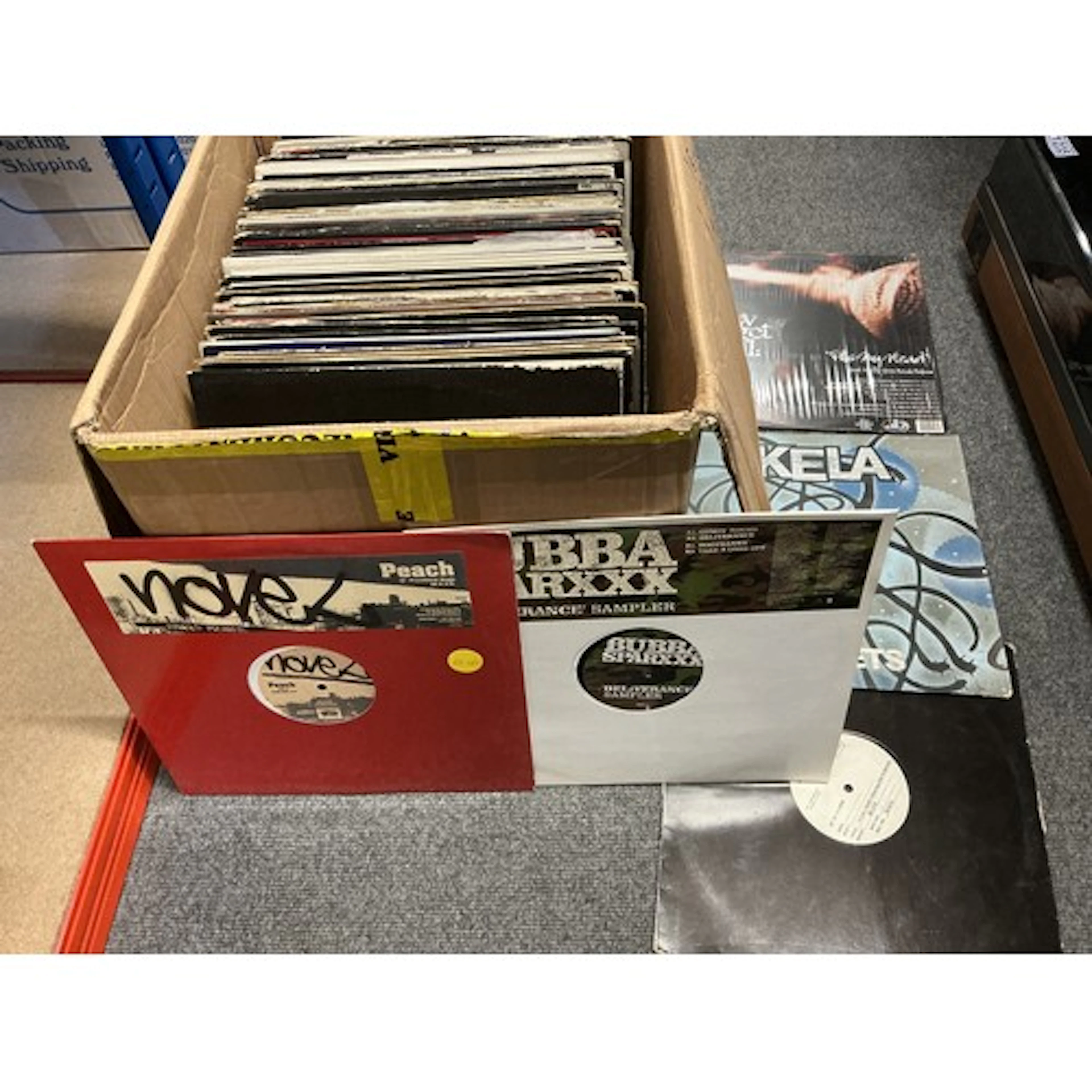 A box of hip hop, house and RnB LPs and 12” singles includin...