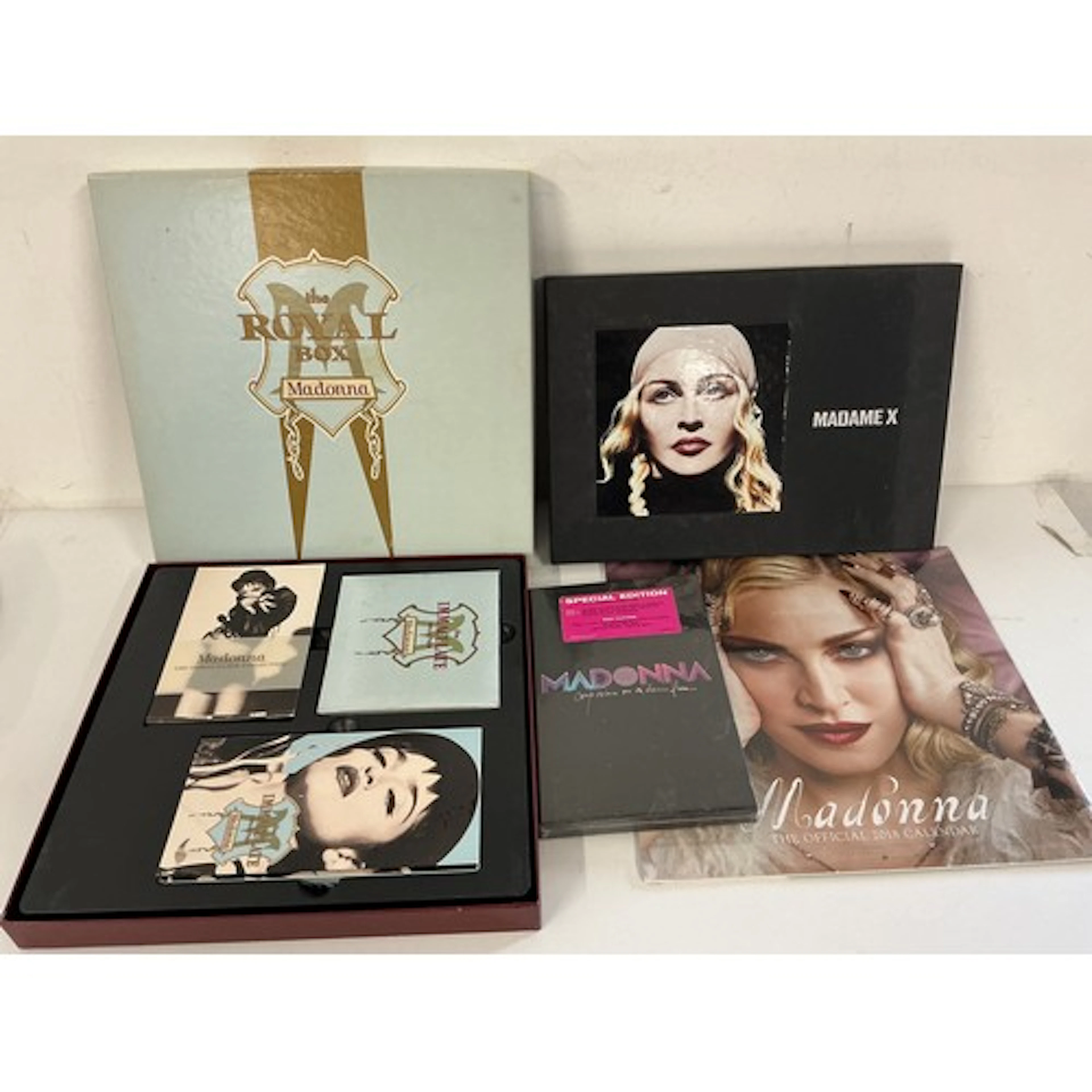 A Madonna Royal Box CD/VHS set, a Madame X vinyl/cassette/CD...