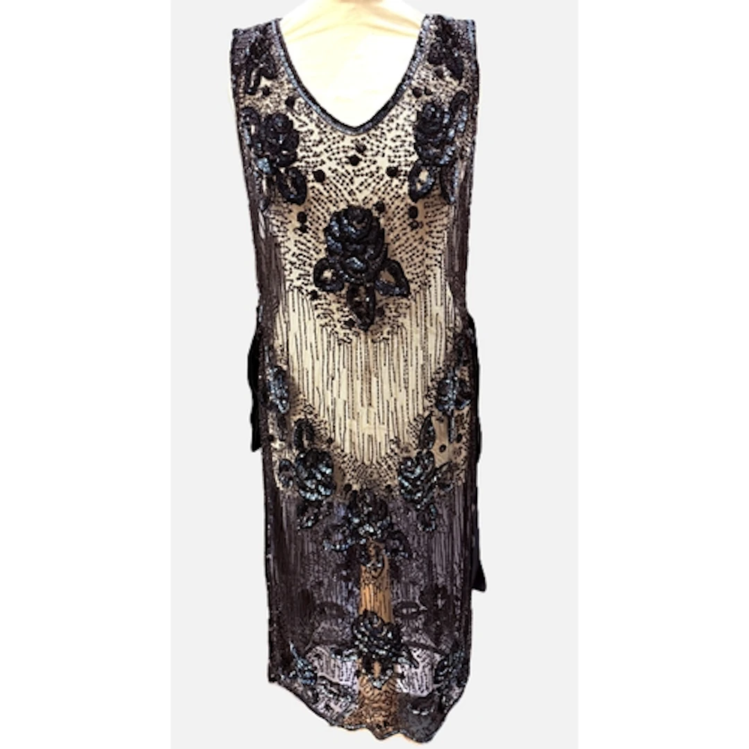 A c.1920's 'flapper' dress / tabard, the sheer black net emb...