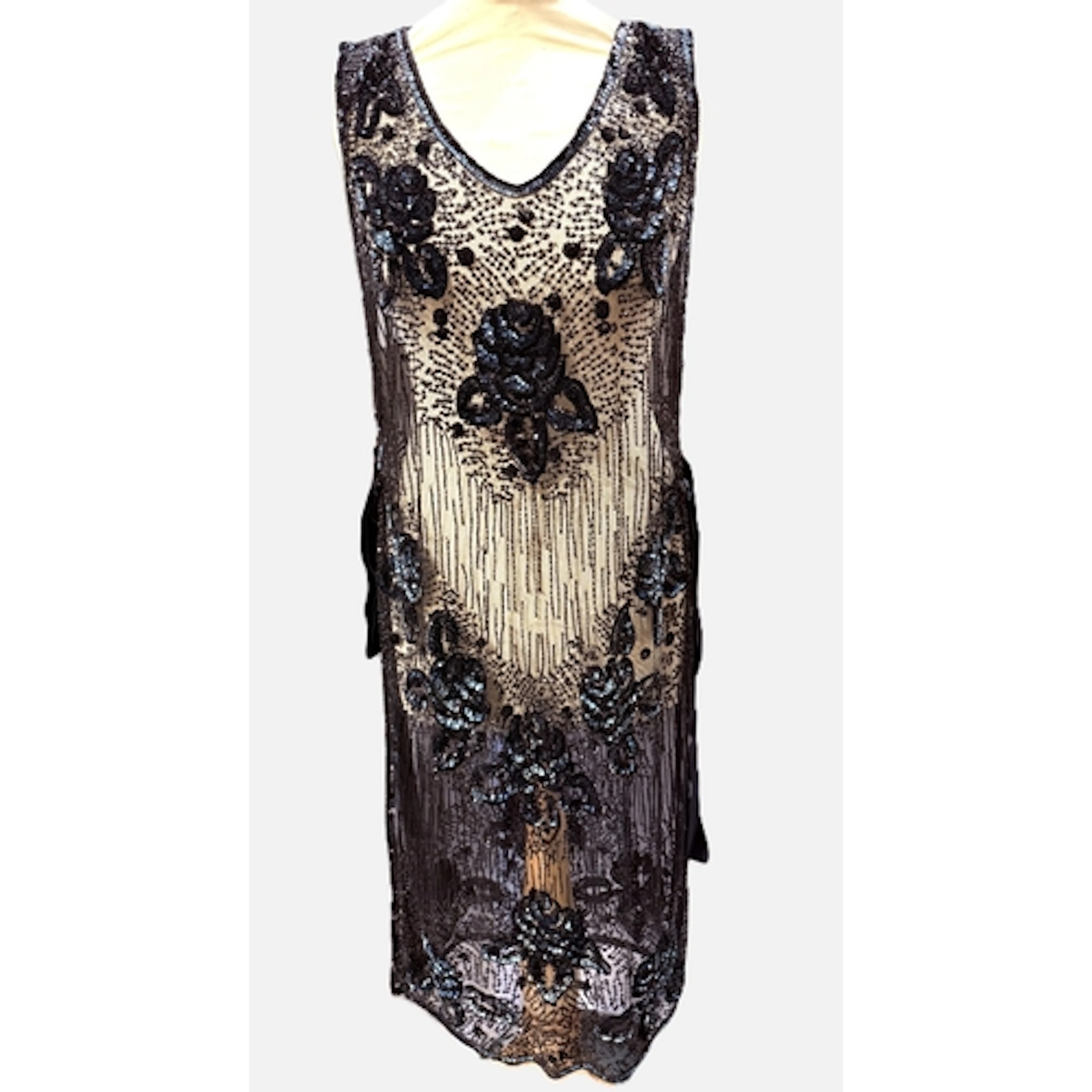 A c.1920's 'flapper' dress / tabard, the sheer black net emb...