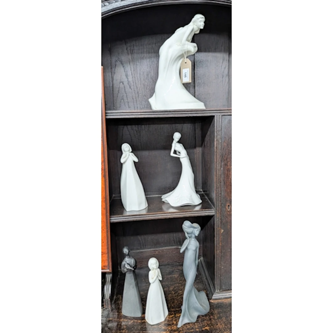 Collection of six black and white figurines by Coalport and ...