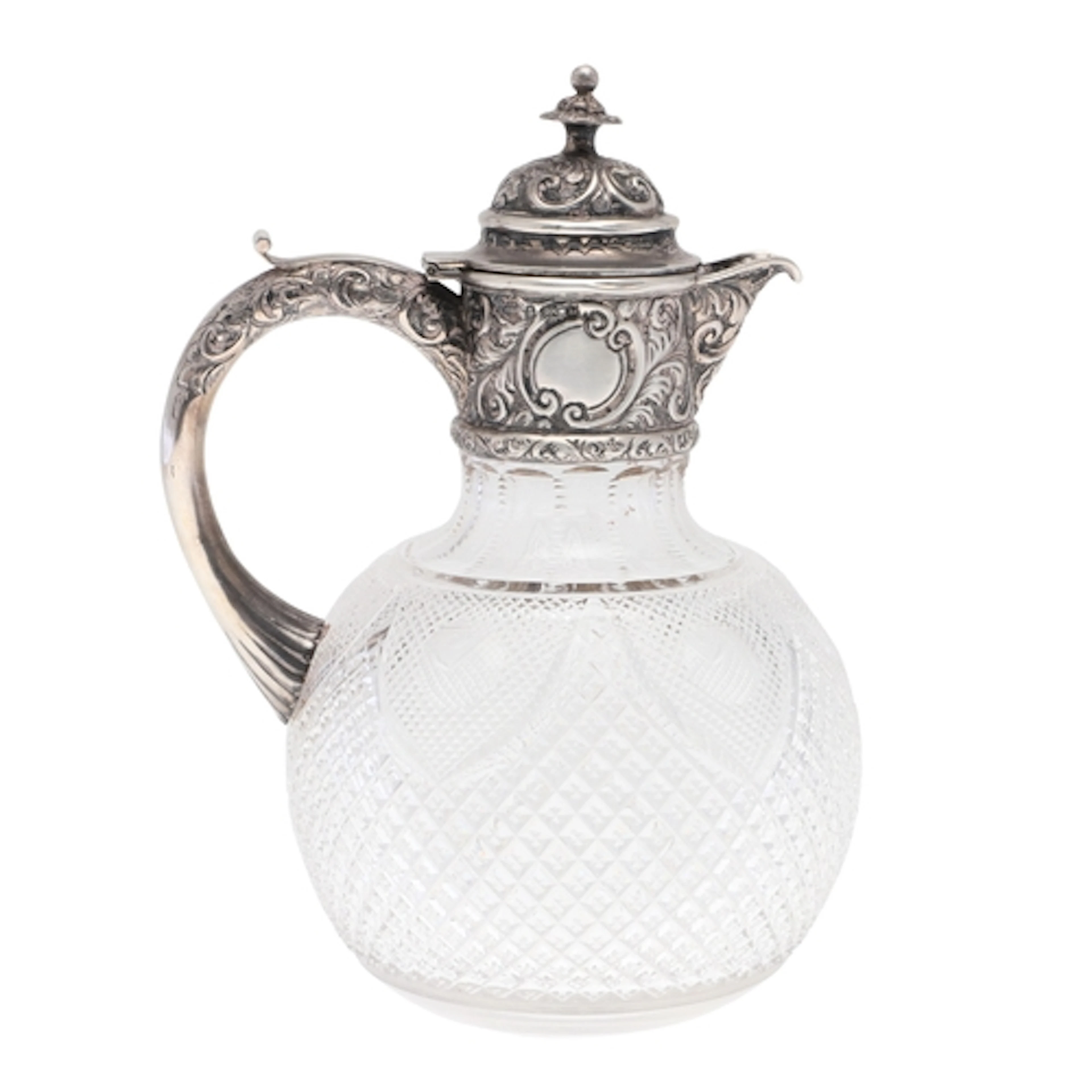 AN EARLY 20TH CENTURY SILVER MOUNTED CUT GLASS CLARET JUG. O...