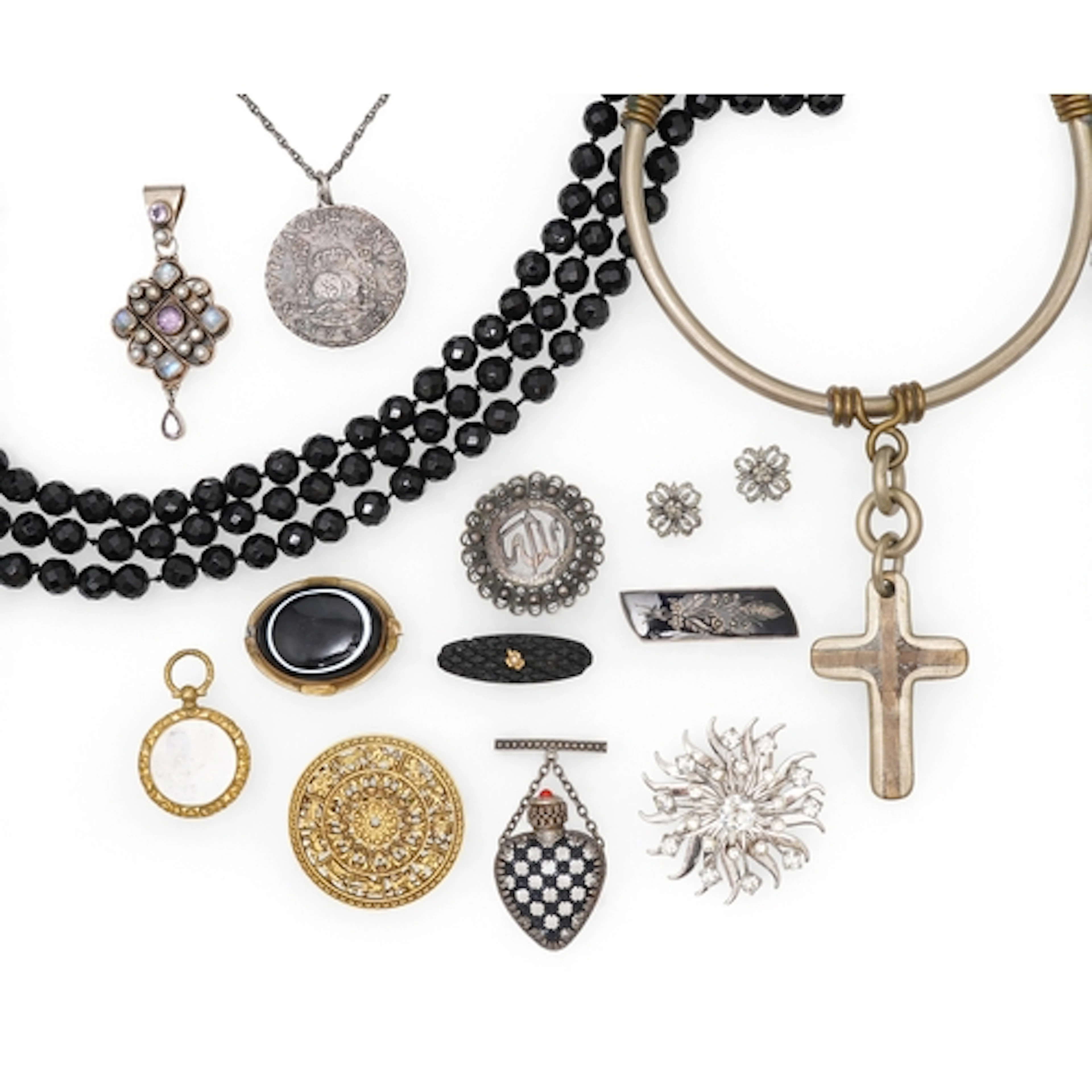 A collection of jewels, comprising: a metal collar necklace ...