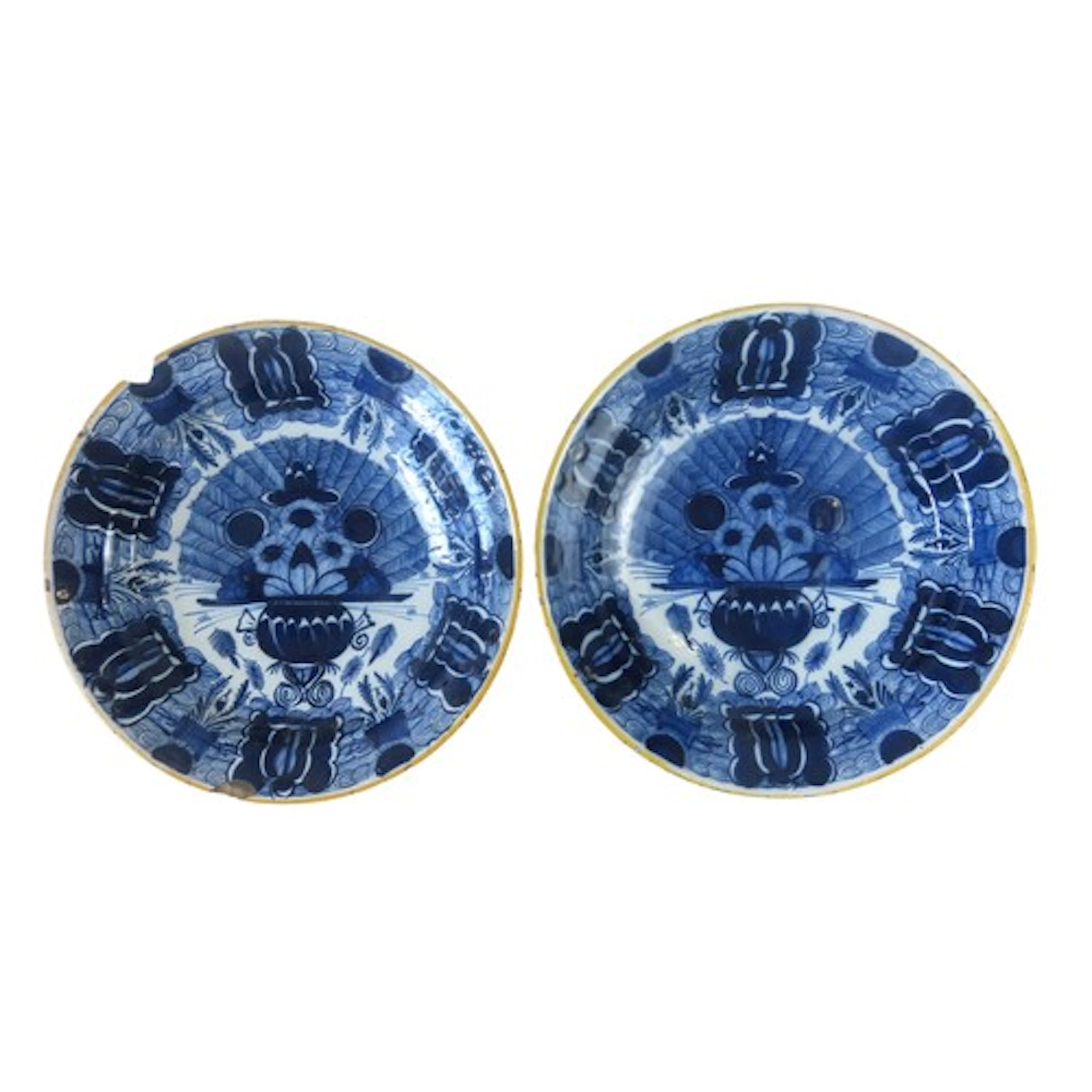 TWO DUTCH DELFT 'PEACOCK' DISHES 18TH CENTURY with ochre pai...