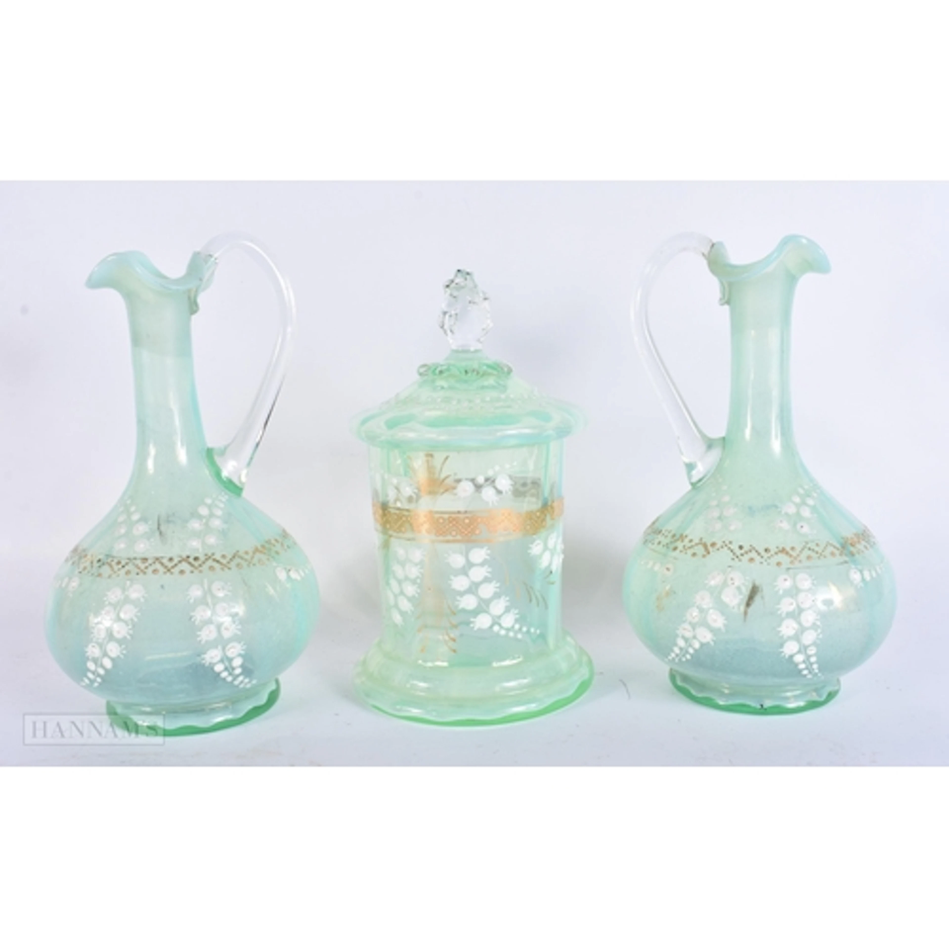 A PAIR OF VICTORIAN OPALINE GLASS JUGS together with a match...