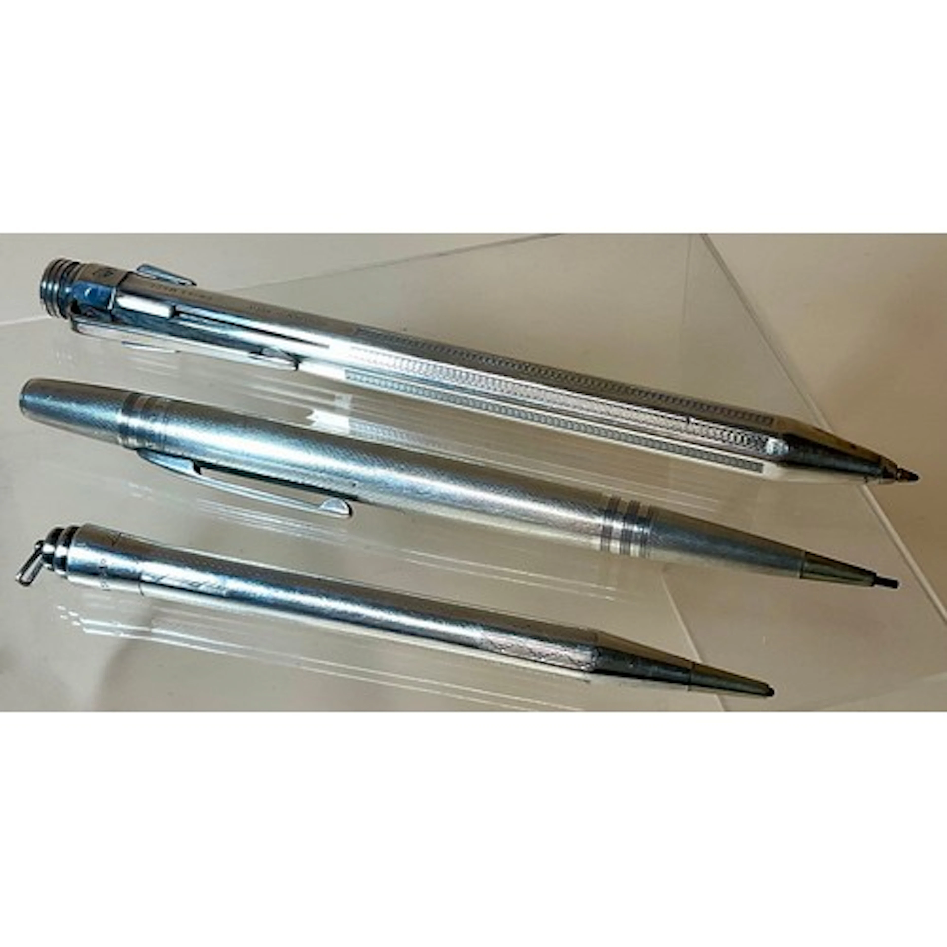 A Caran D-Ache Art Deco style four section ball point pen, e...