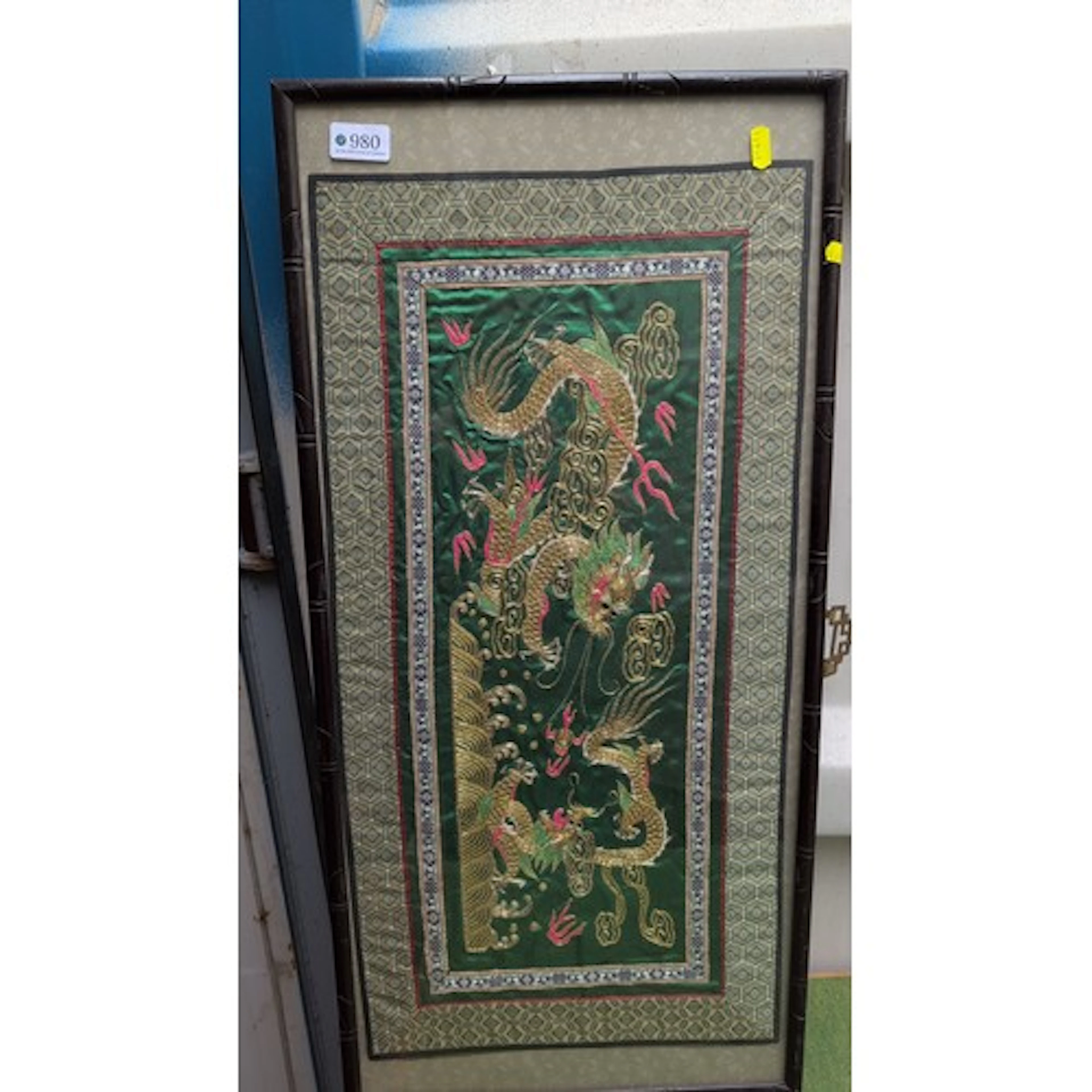 Chinese-style silk embroidery panel depicting two confrontin...
