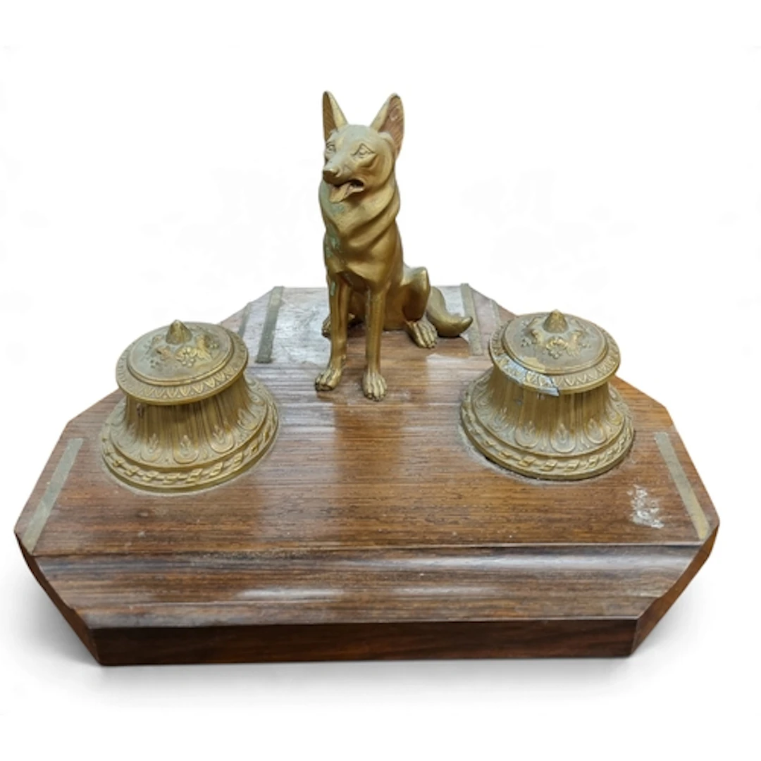 A good early 20th Century Hardwood Desk Stand depicting a Ge...