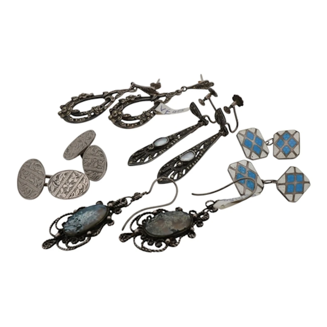 Three assorted pairs of white metal drop earrings or ear cli...