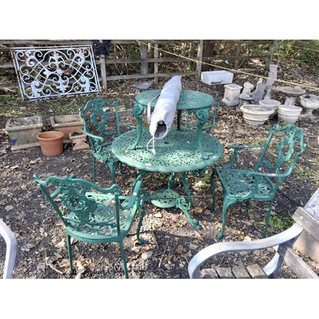 A HEAVY DUTY CAST ALUMINIUM GARDEN TABLE 93cm in diameter, f...