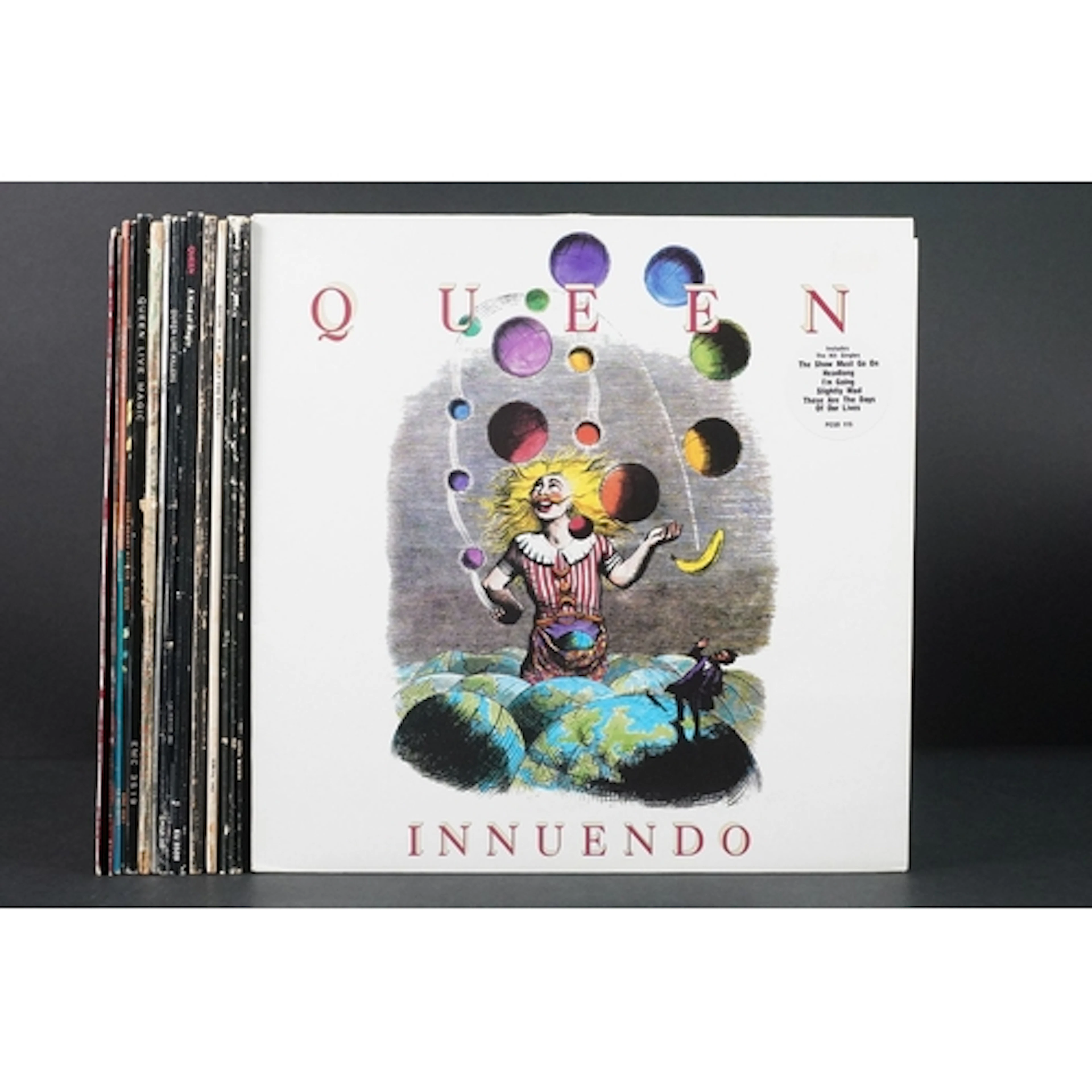 Vinyl - 12 Queen LPs and 2 12" singles spanning their career...