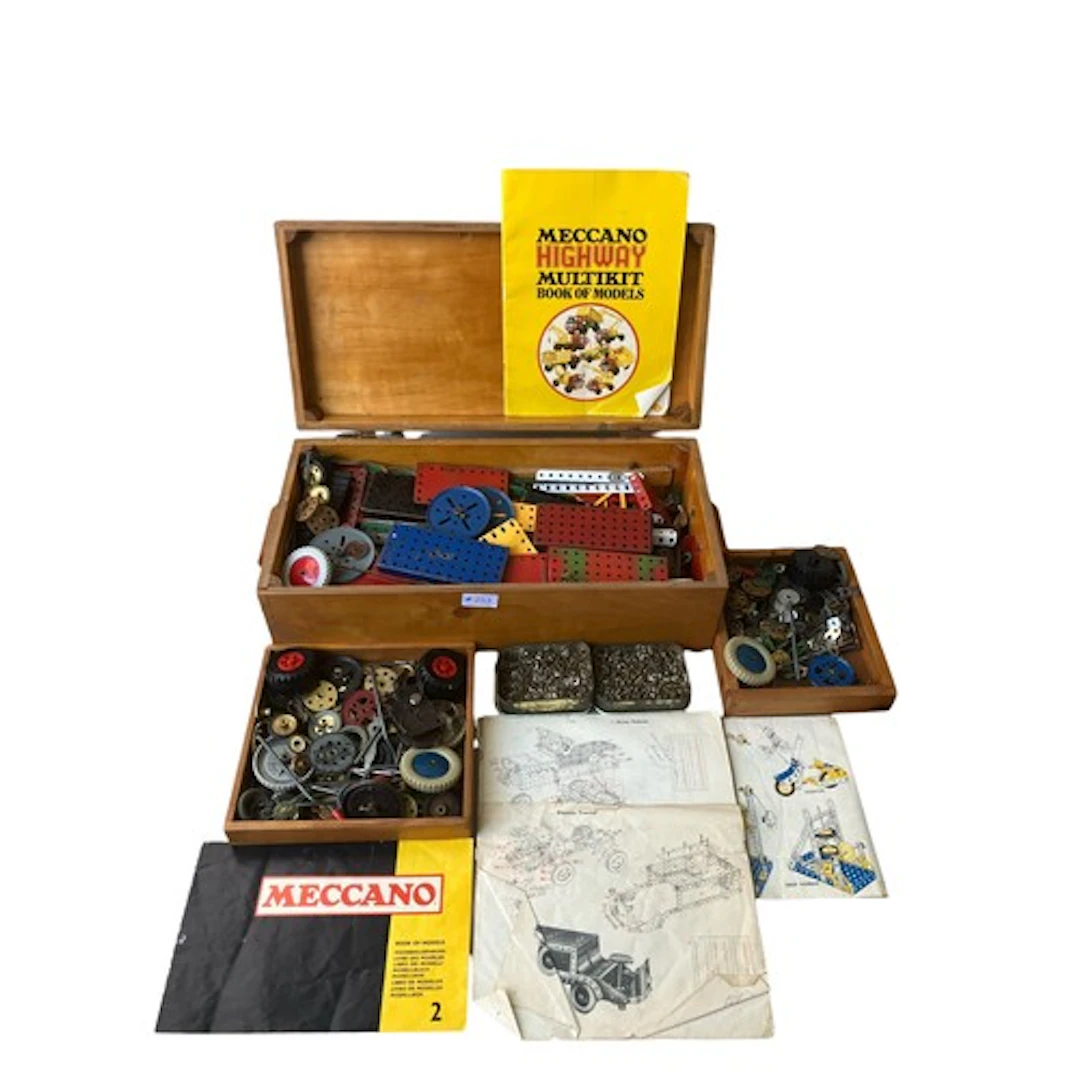 Quantity of vintage Meccano in a wooden storage box