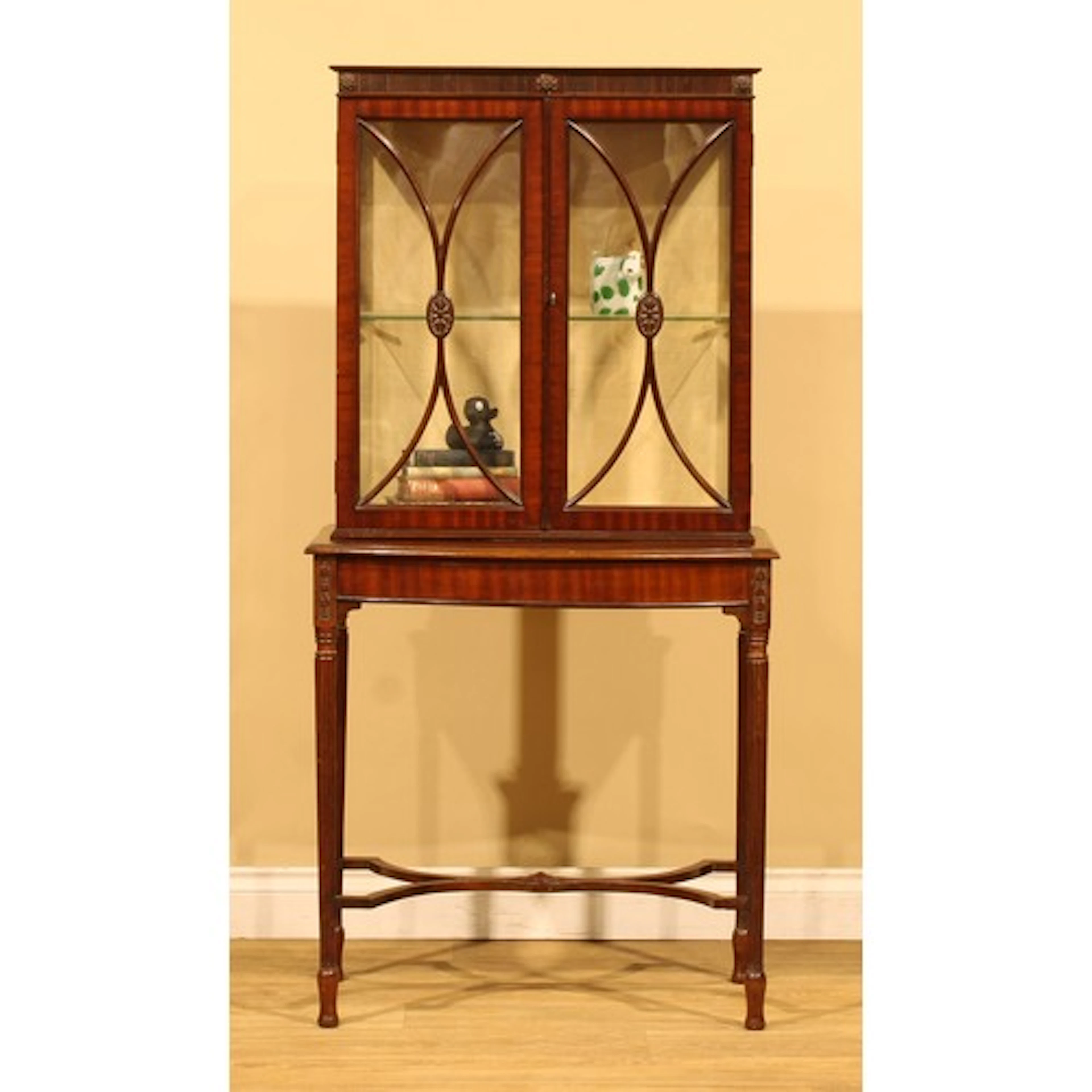 A Sheraton Revival mahogany pier display cabinet or bookcase...