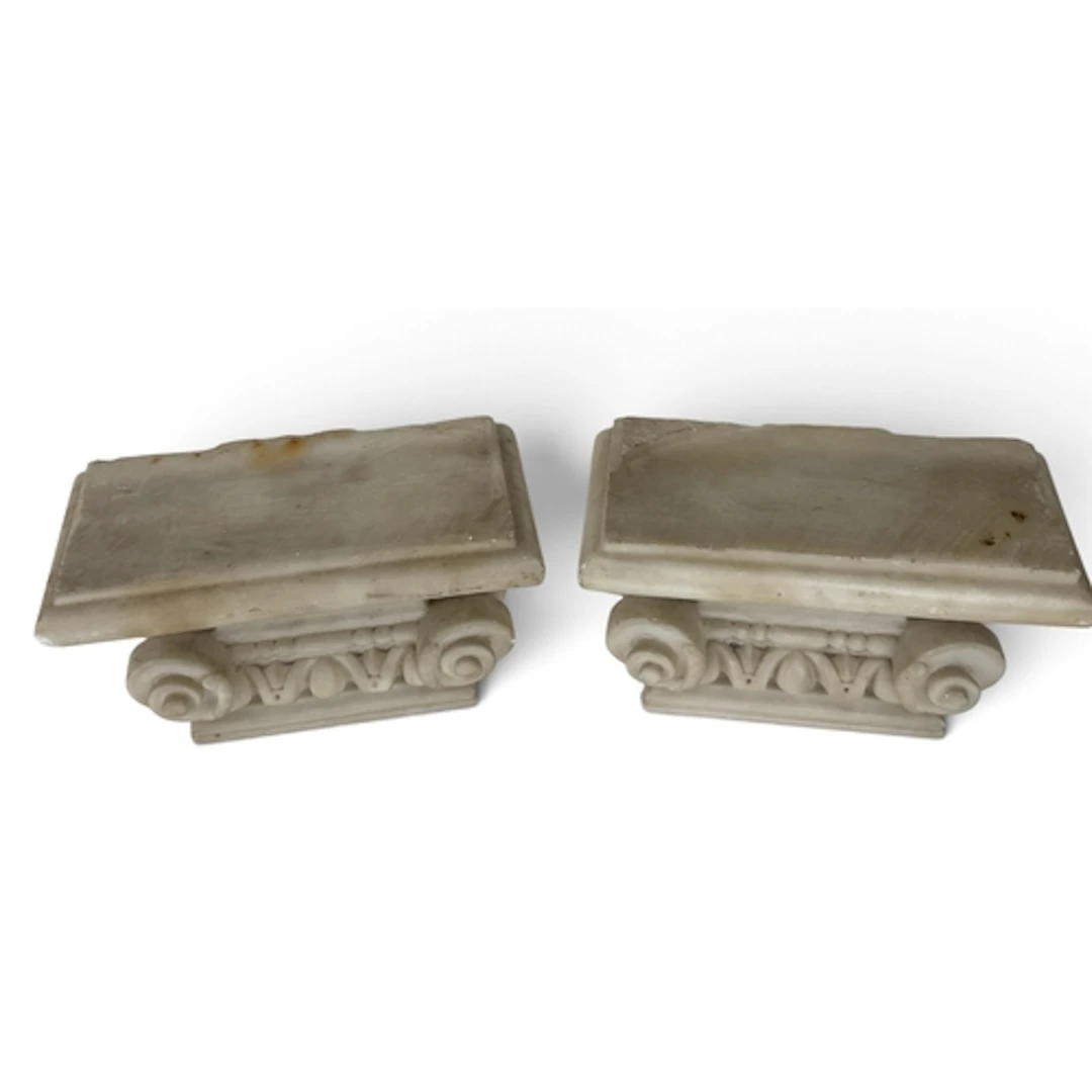 A PAIR OF ALABASTER CAPITALS 23cm W x 10cm D x 15cm H...