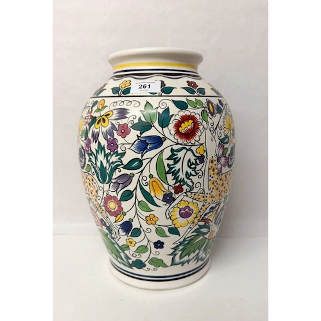 A large Poole Pottery vase decorated in the Persian Deer pat...