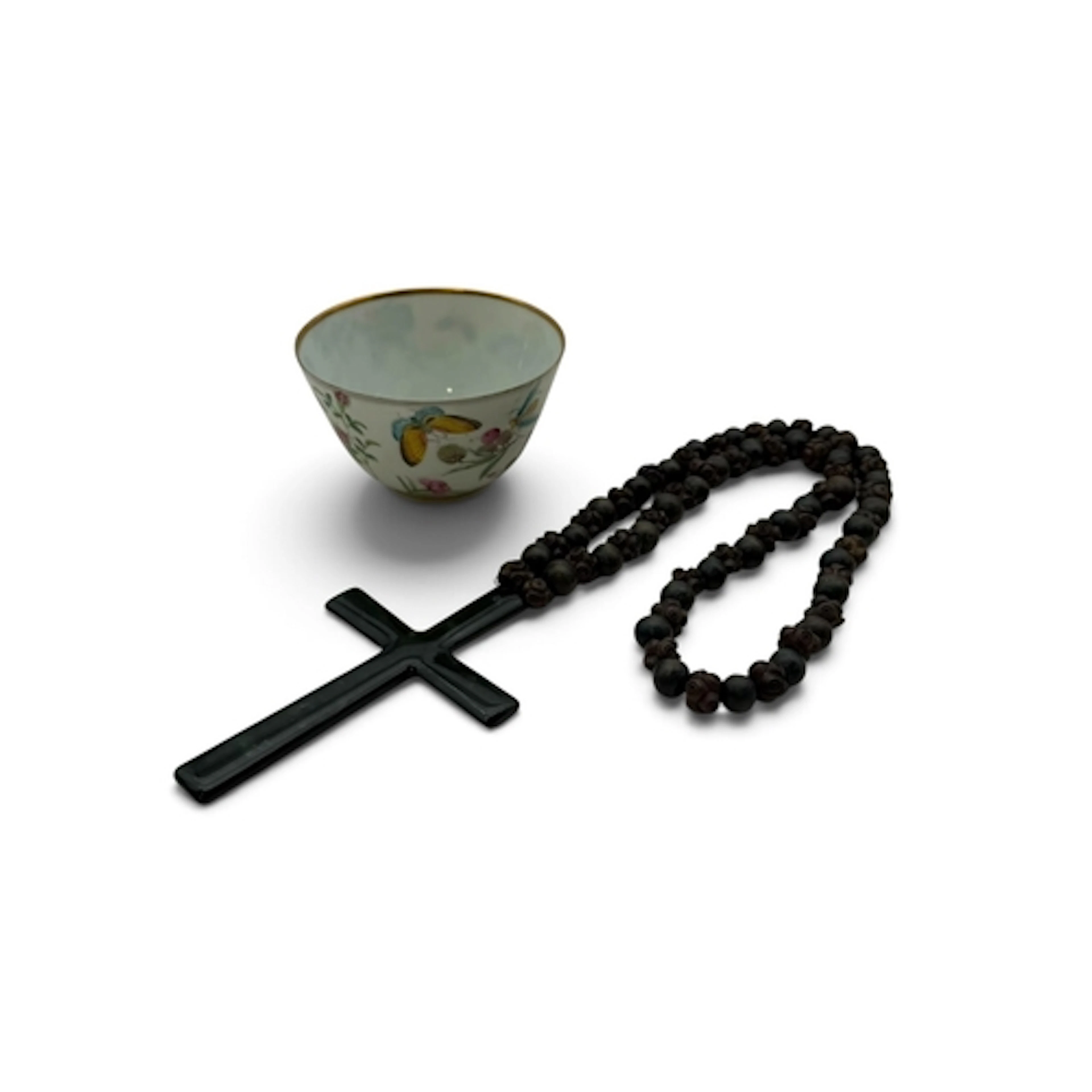 A JADEITE CROSS PENDANT WITH CARVED WOODEN BEADED NECKLACE T...