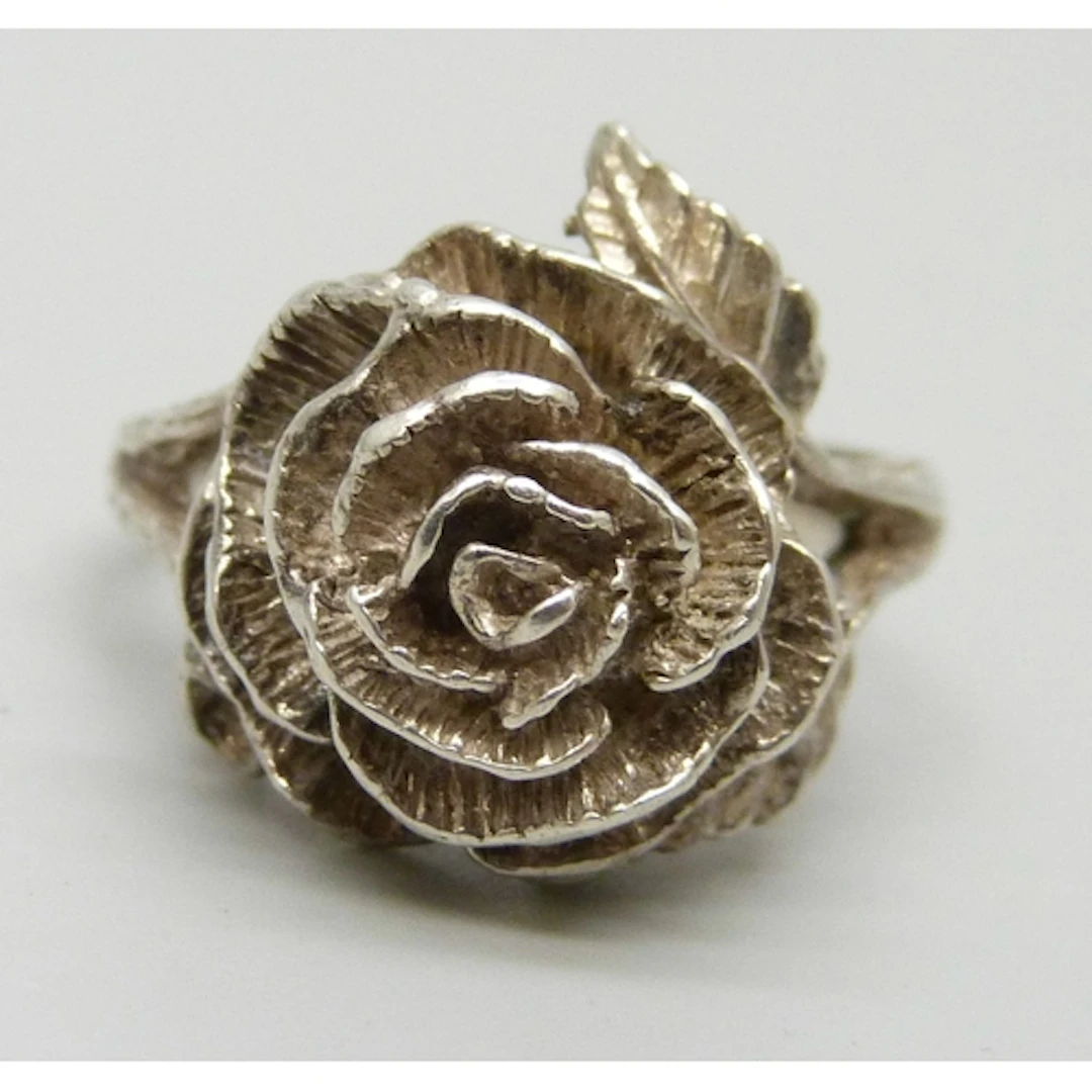 Paul Edward Bunn, a silver flower design ring, Birmingham, 1...