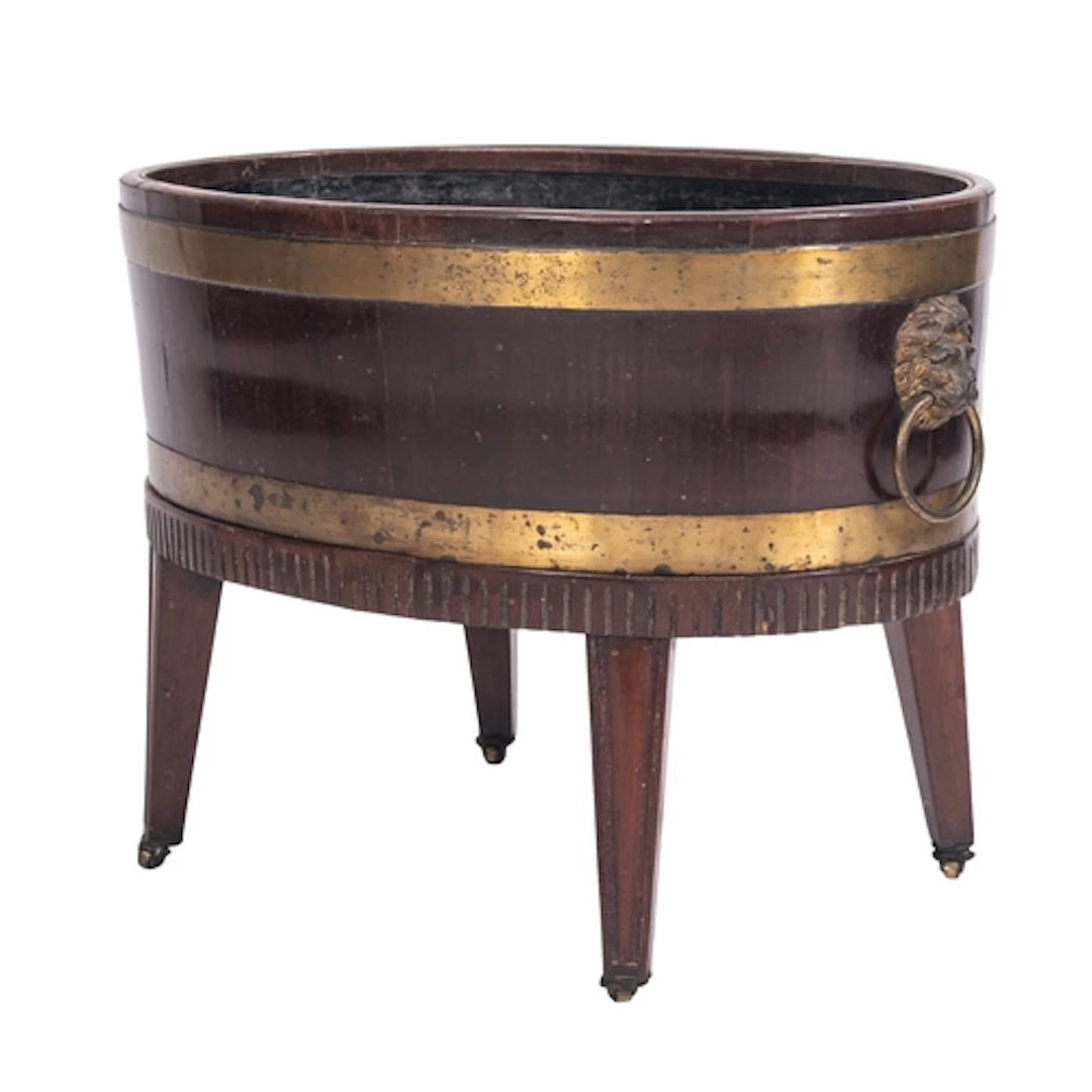 A George III mahogany and gilt brass mounted cellaret, circa...