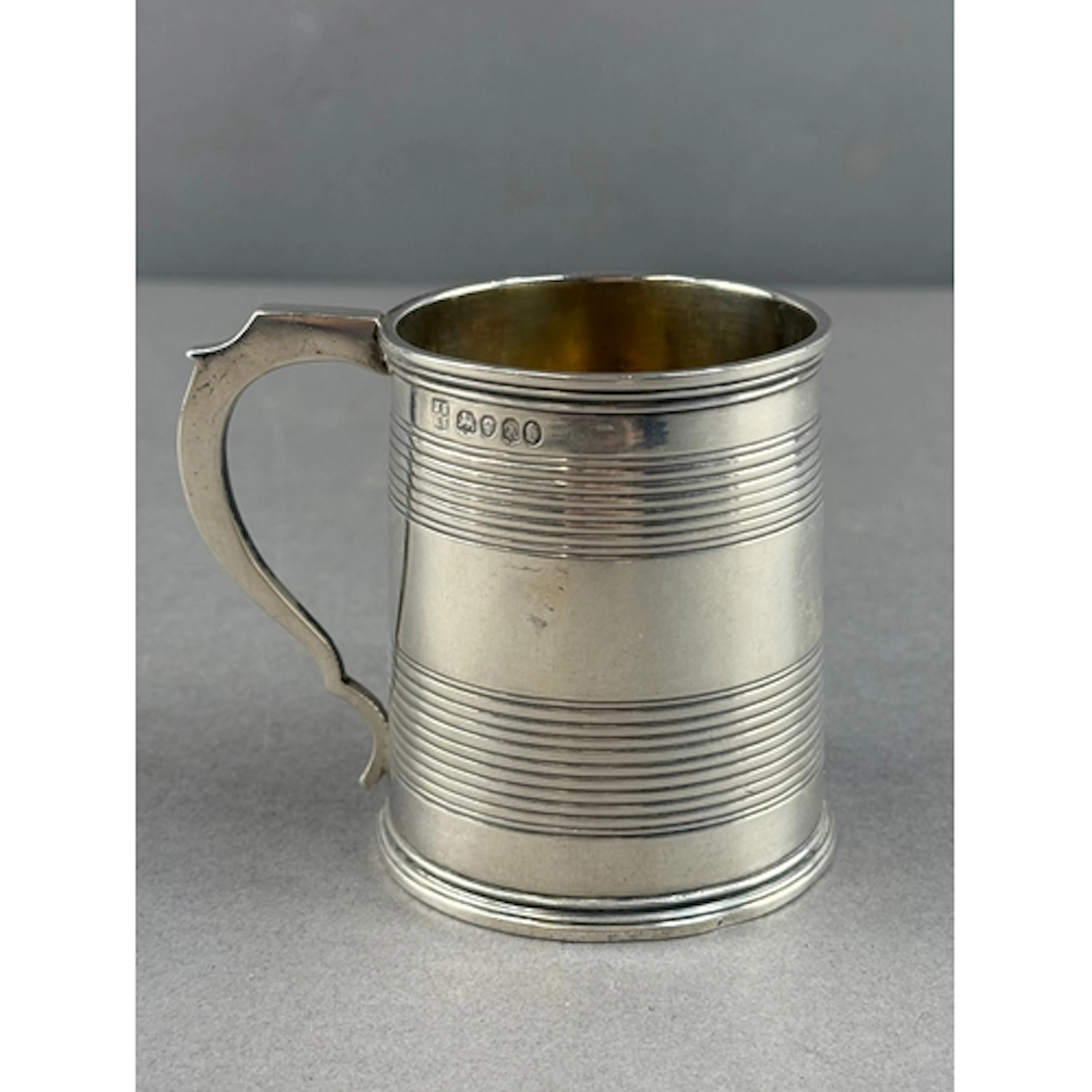 Silver: a tapering christening mug by Joseph & Albert Sa...