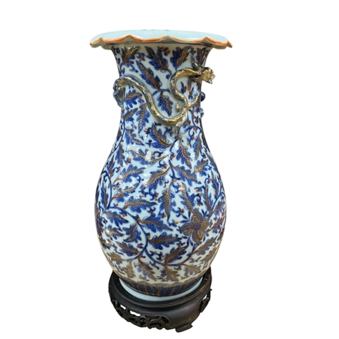 A 19th century Chinese porcelain baluster vase with relief m...