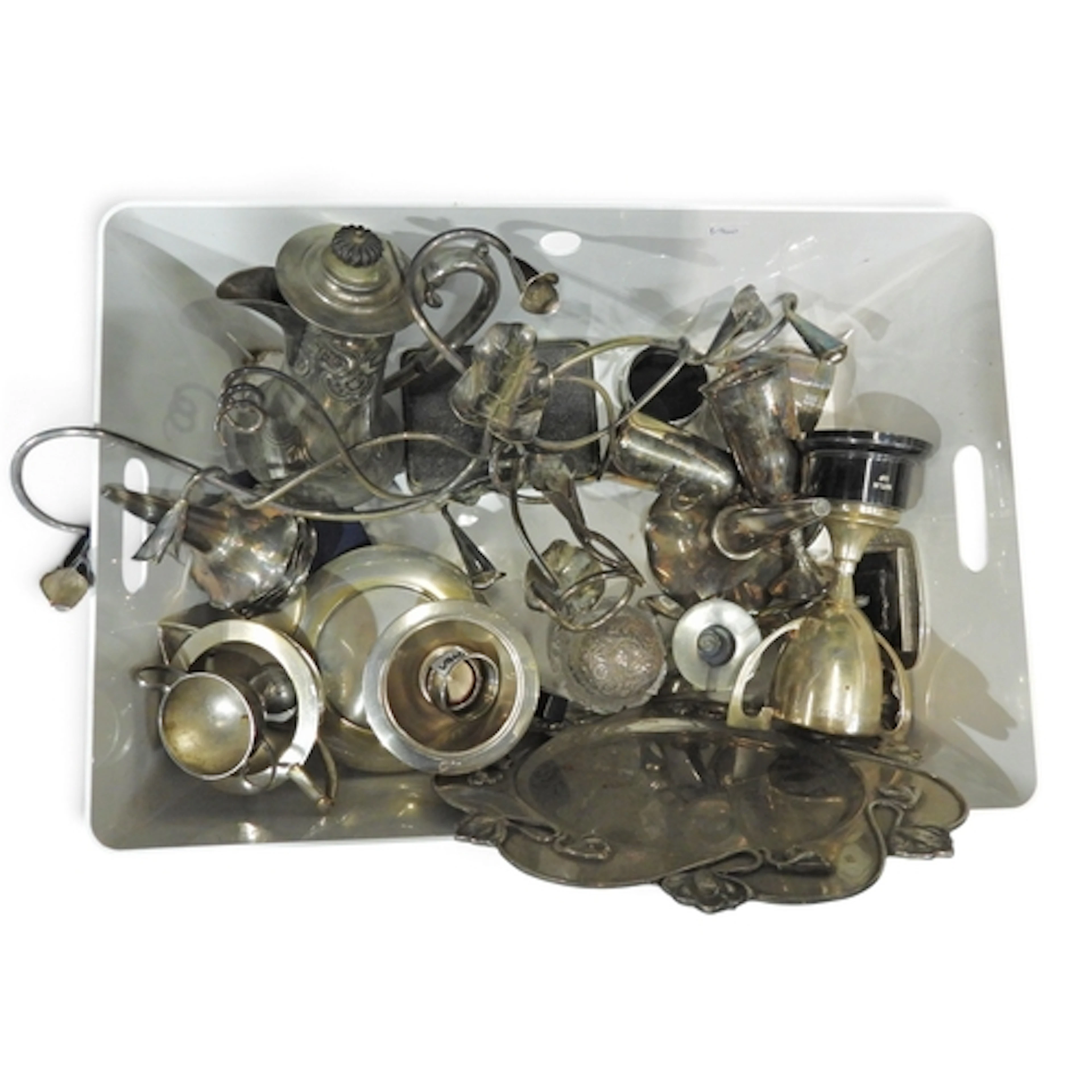 A box containing:- a silver topped bottle and a napkin ring,...