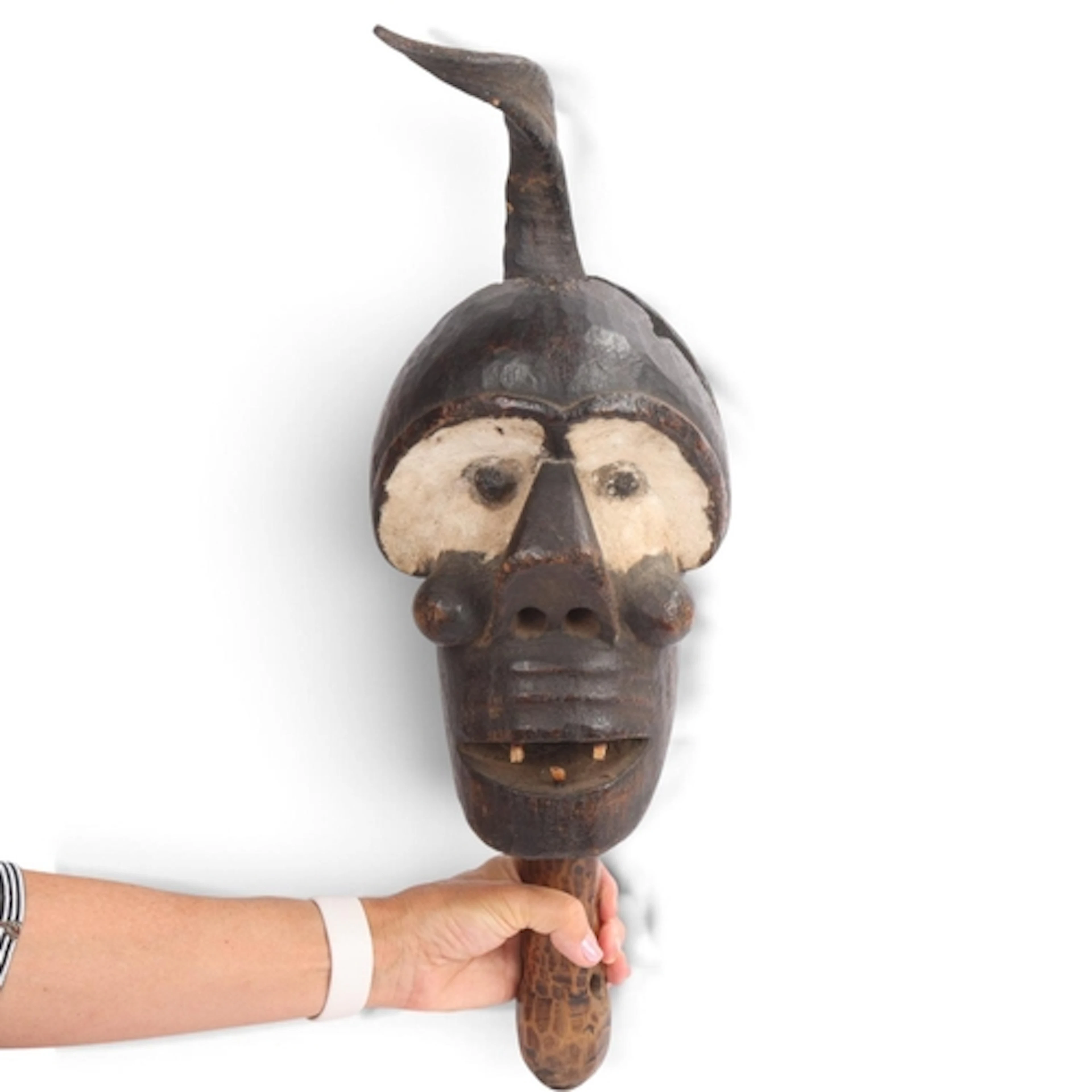 A Dan Janiform double-faced mask, carved and painted wood wi...