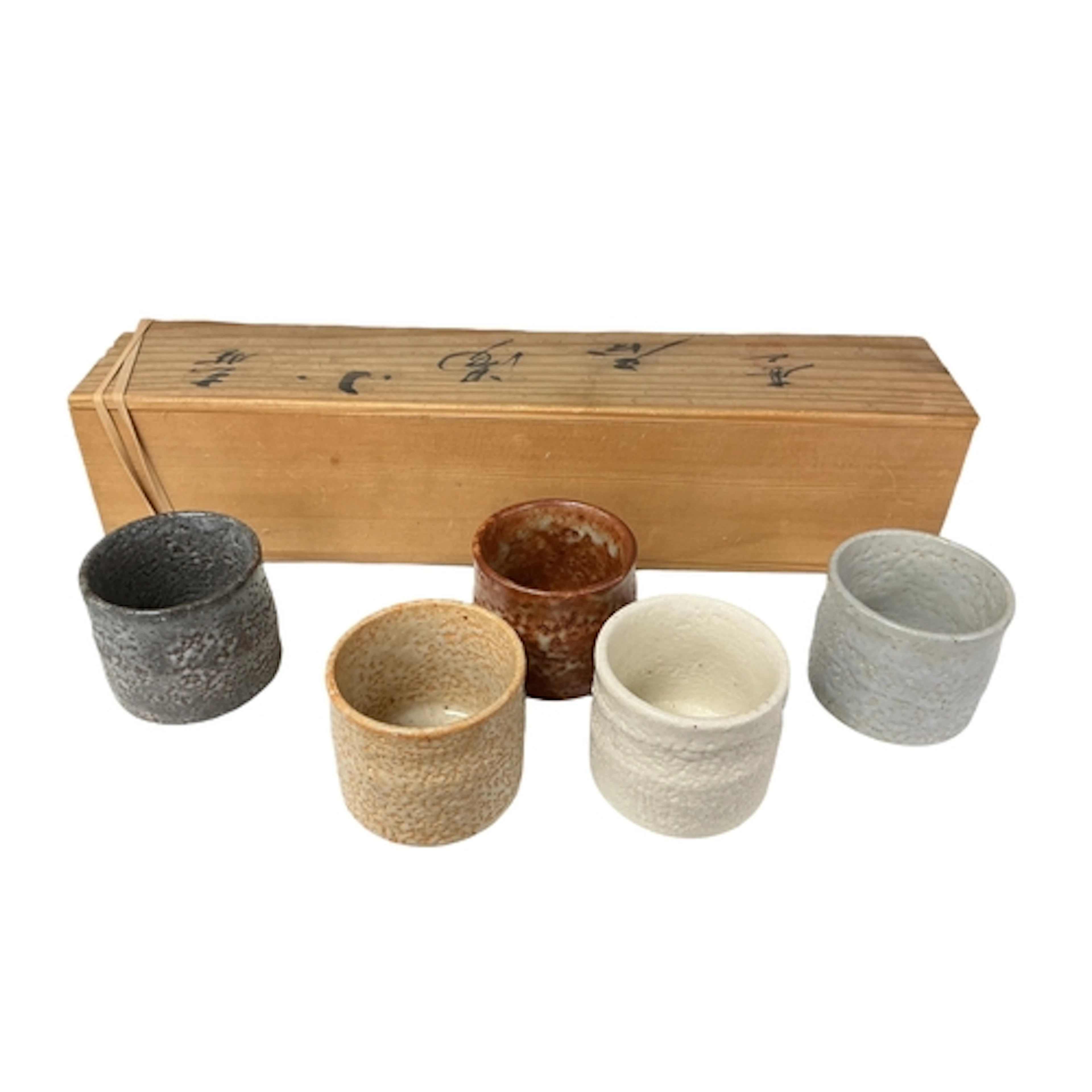 A Fujie Miyama Sakeware Set, comprising five pottery sake cu...