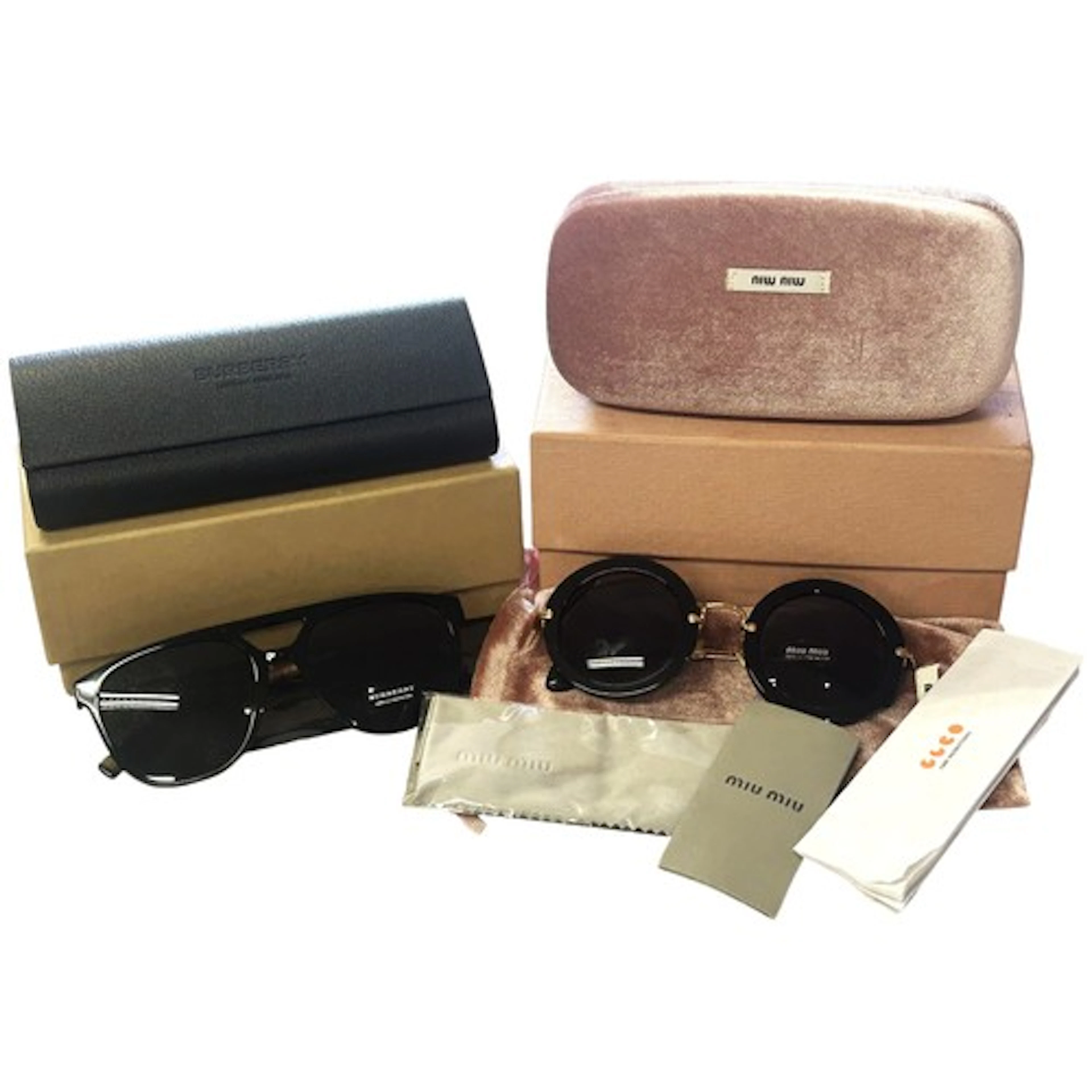Pair of Burberry designer sunglasses with polishing cloth, t...