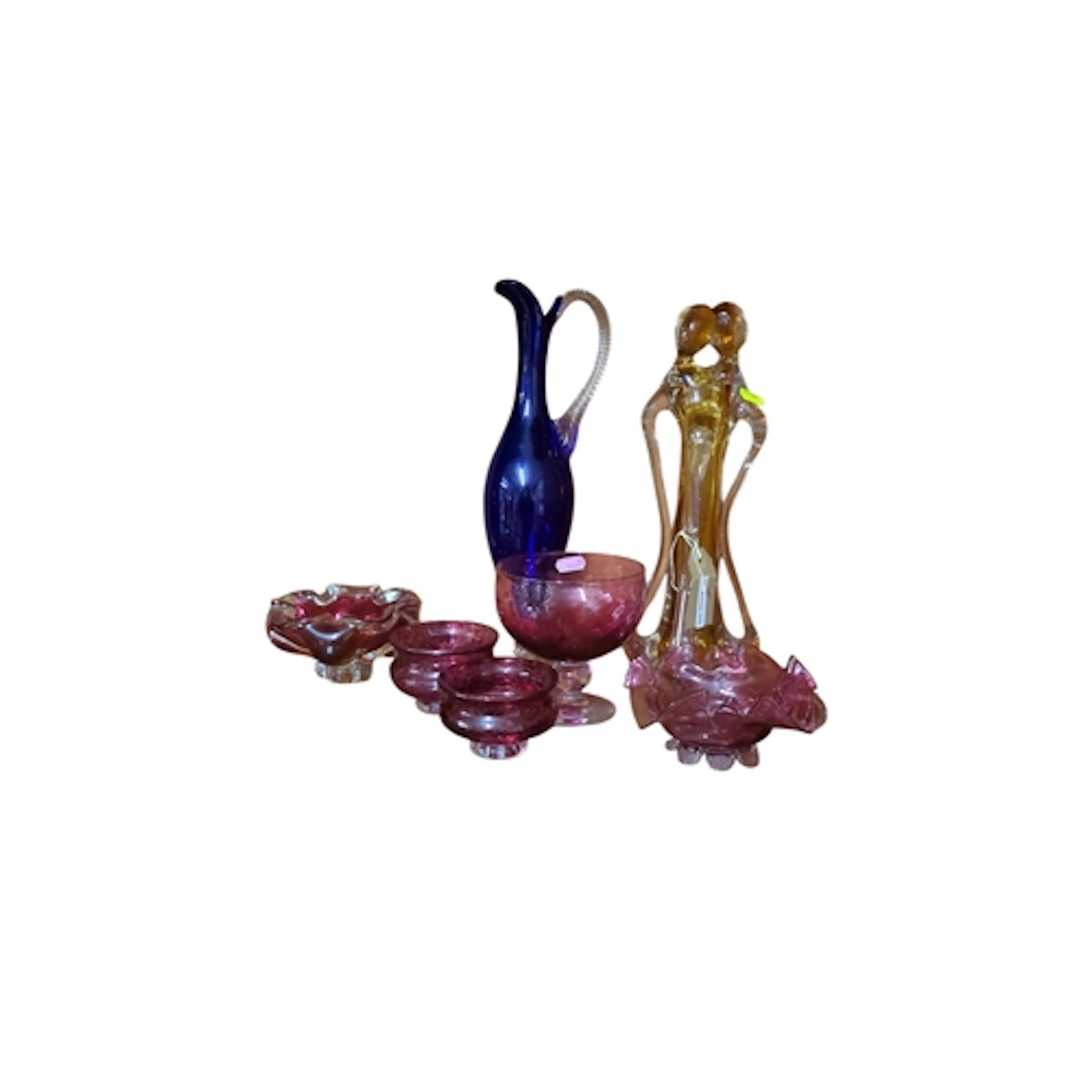 A group of coloured art glass comprising a cobalt-blue foote...