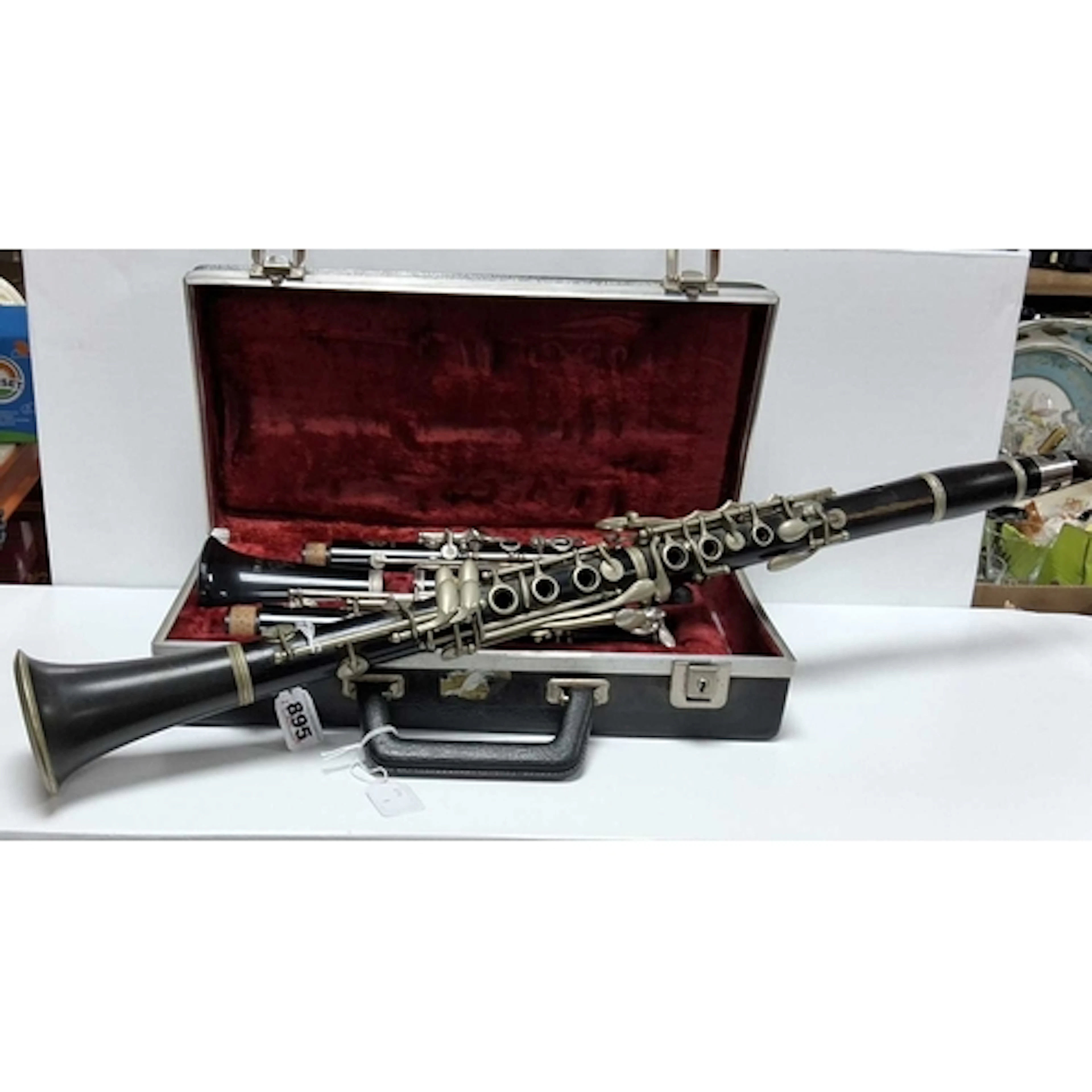 A CASED CLARINET AND LOOSE CLARINET, to include a 'Regent' B...