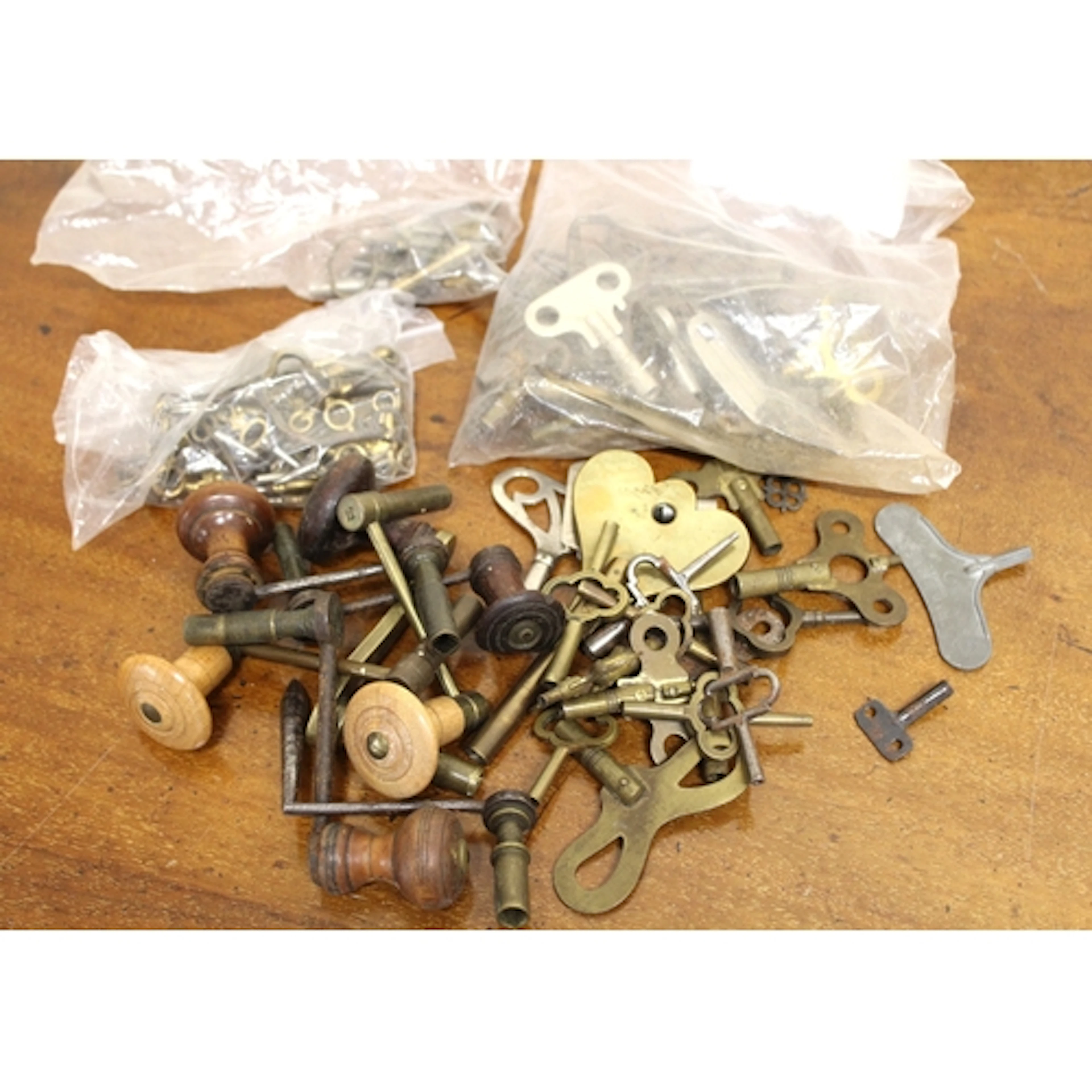 Quantity of longcase clock keys, and other clock and watch k...