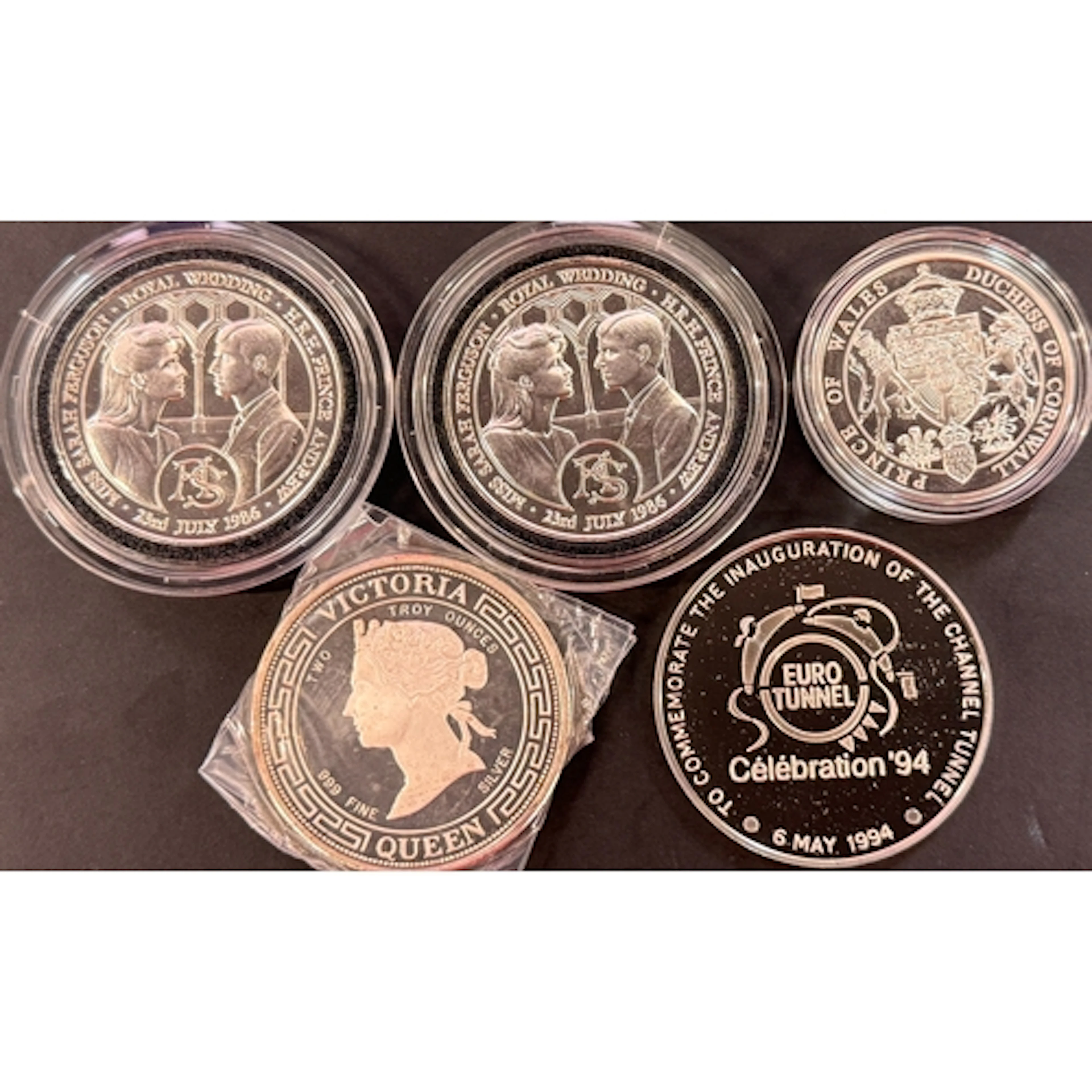A group of five silver medallions, comprising 2005 Wedding o...