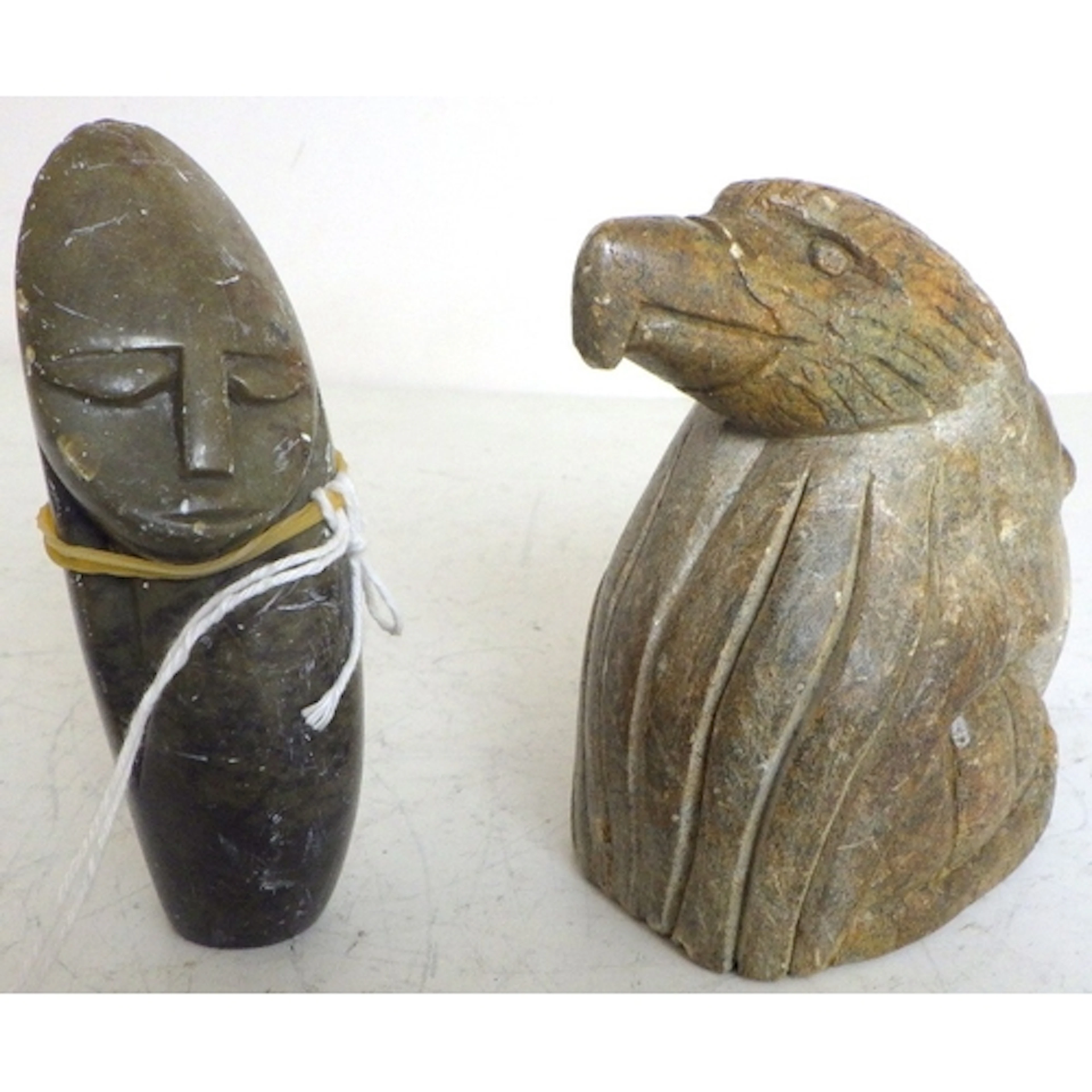 A small carved Shona marble figure (12cm) together with a Da...