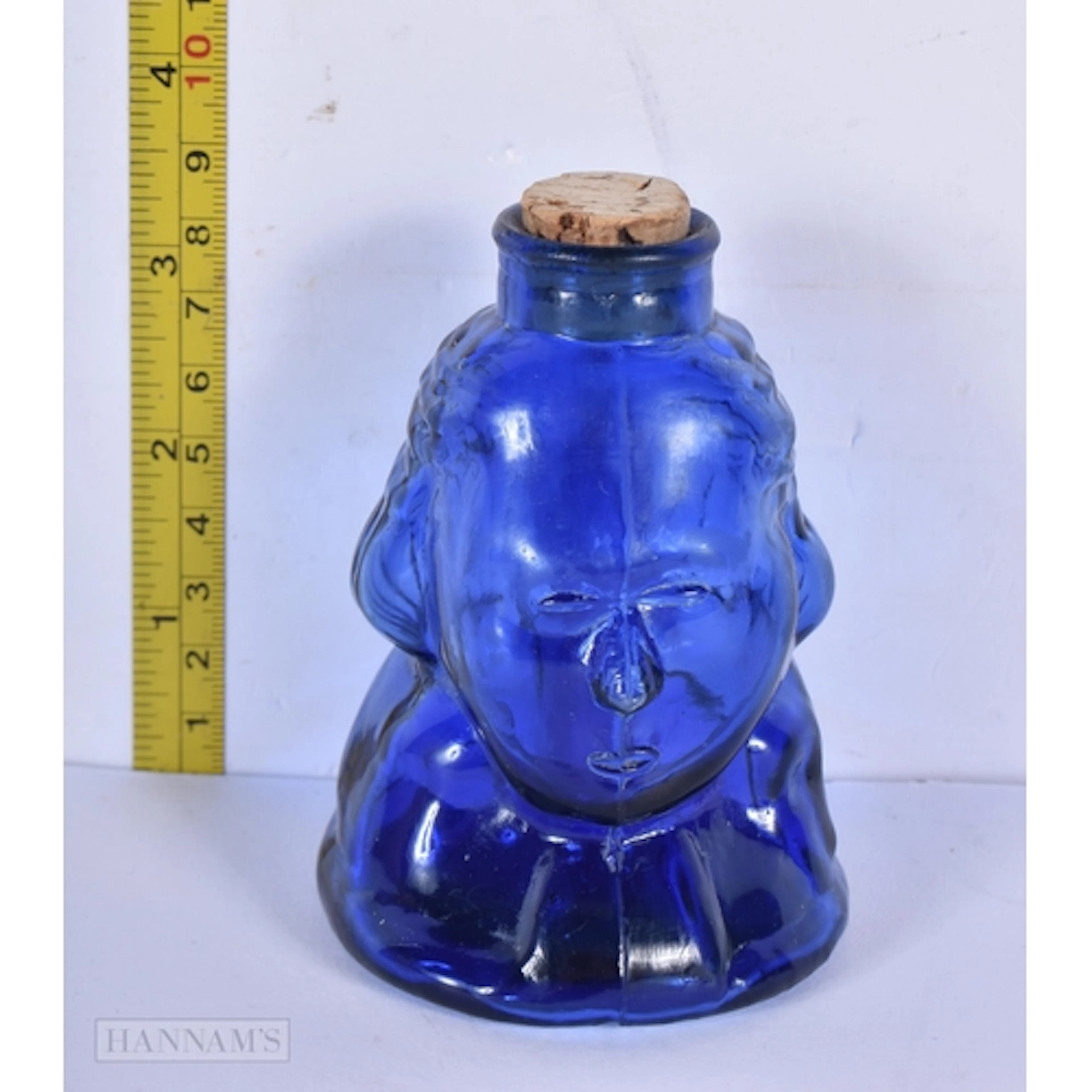 A vintage George Washington glass bottle 10cm