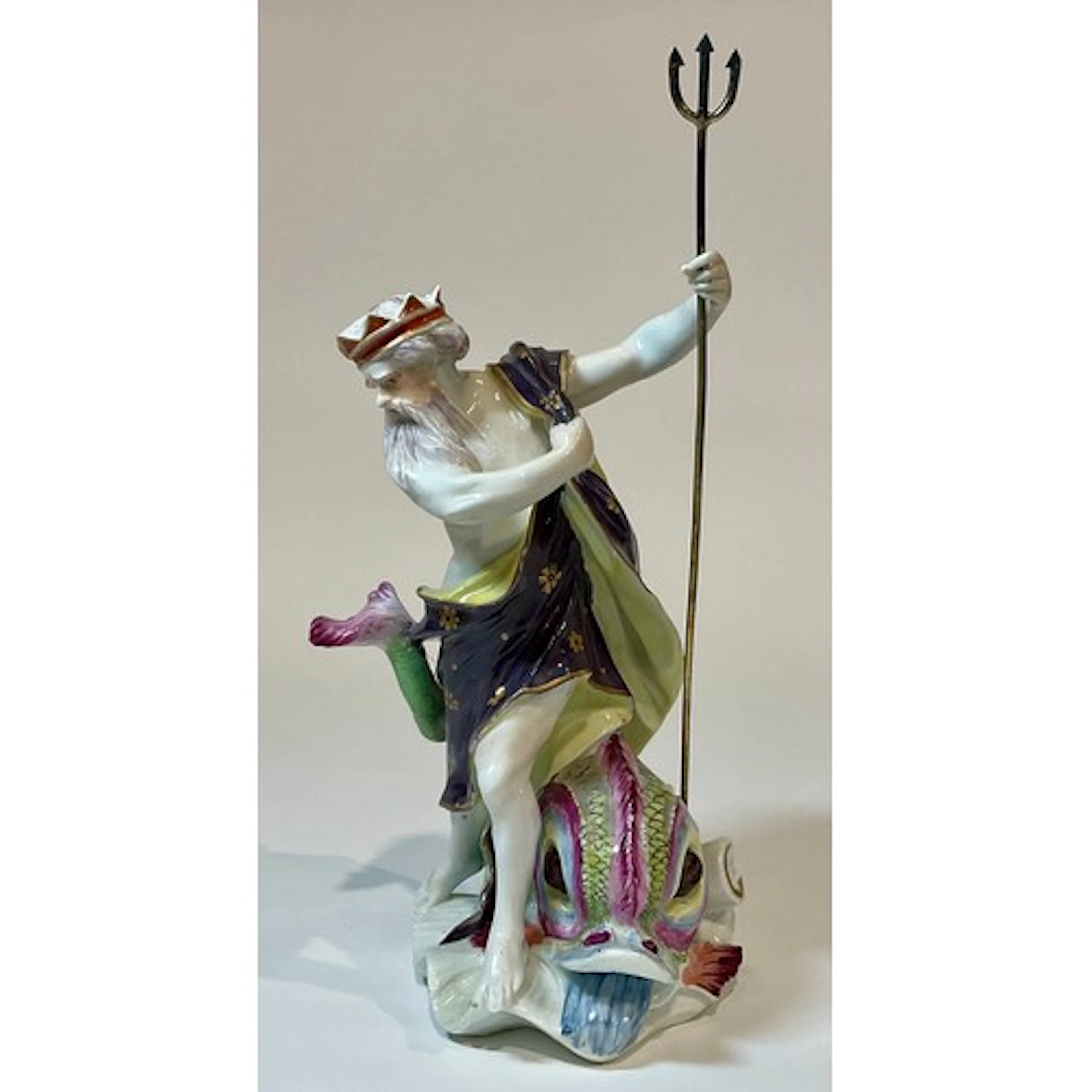 A Derby figure, of Neptune, standing holding a trident, a do...