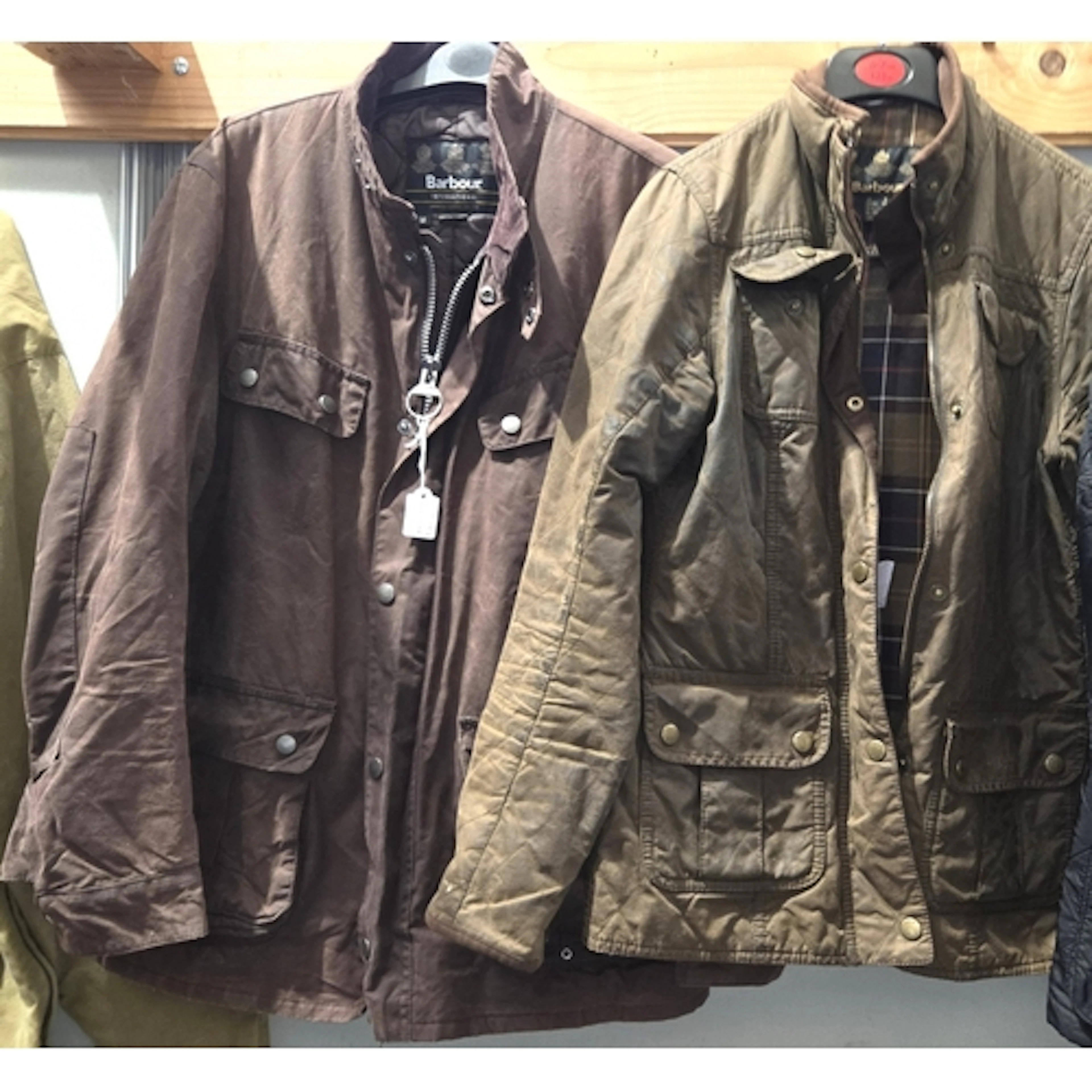 A Barbour International Medium brown wax jacket, and a Barbo...
