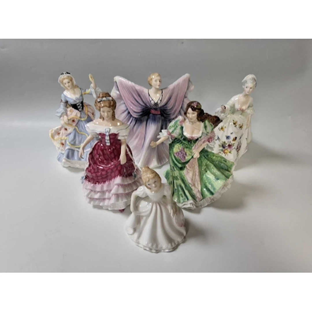 A GROUP OF SIX PORCELAIN FIGURINES BY ROYAL DOULTON comprisi...