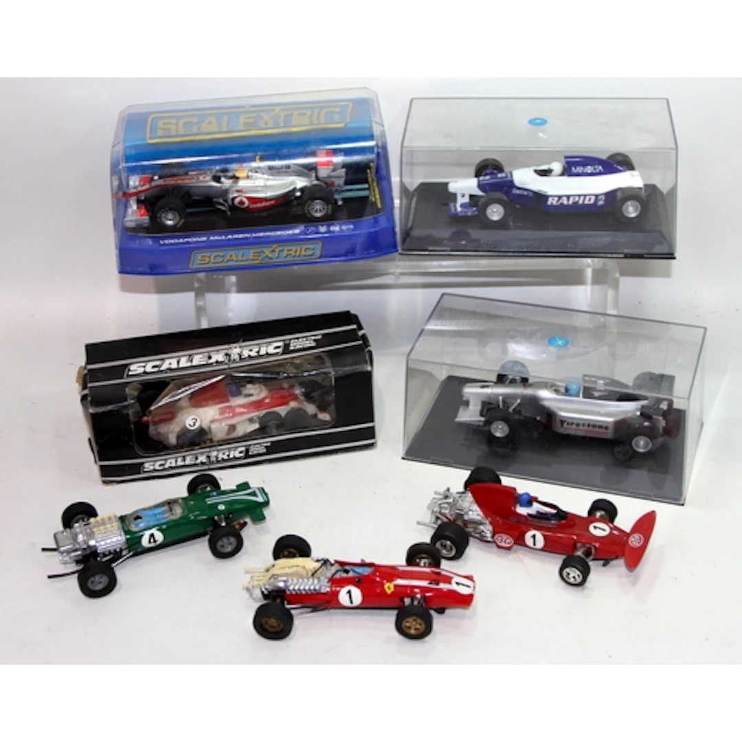 A collection of Scalextric slot car racing cars, 7 in lot, s...