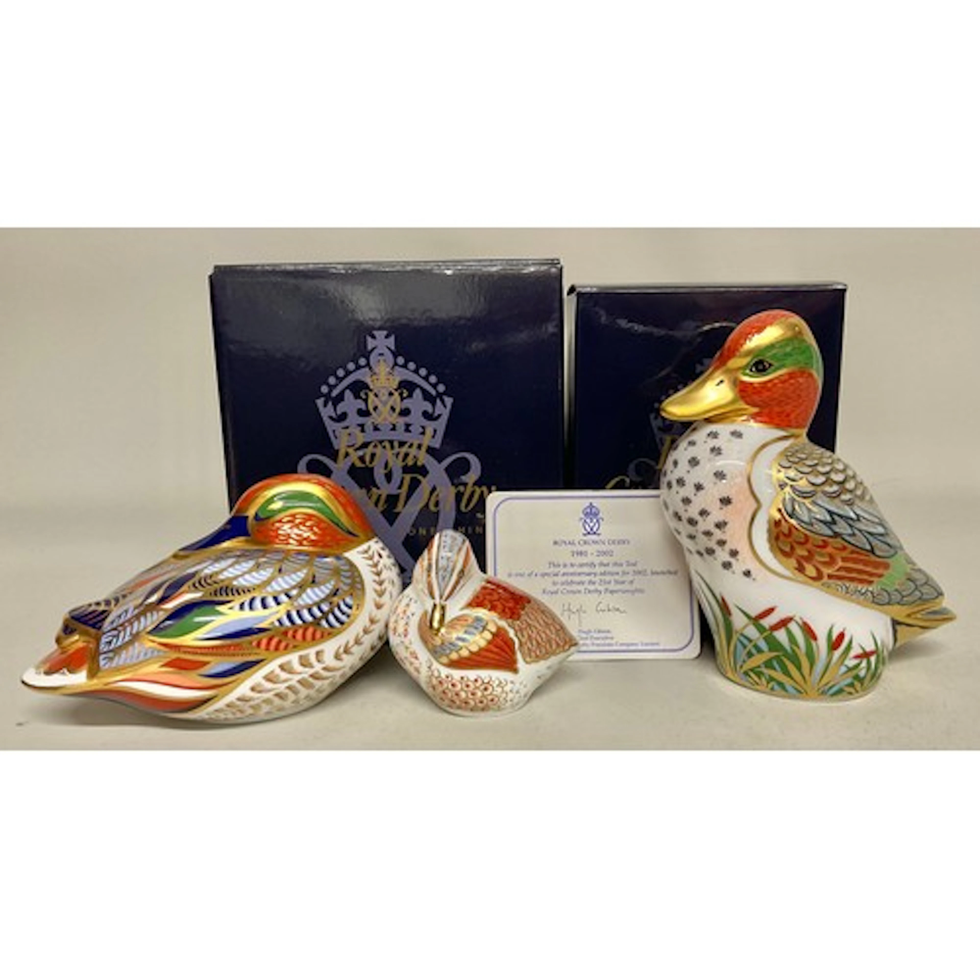 An associated Royal Crown Derby paperweight family, comprisi...