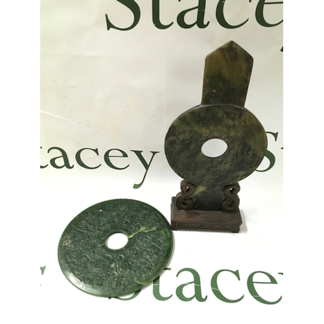 Jade carved spinach nephrite jade bi discs, one mounted...