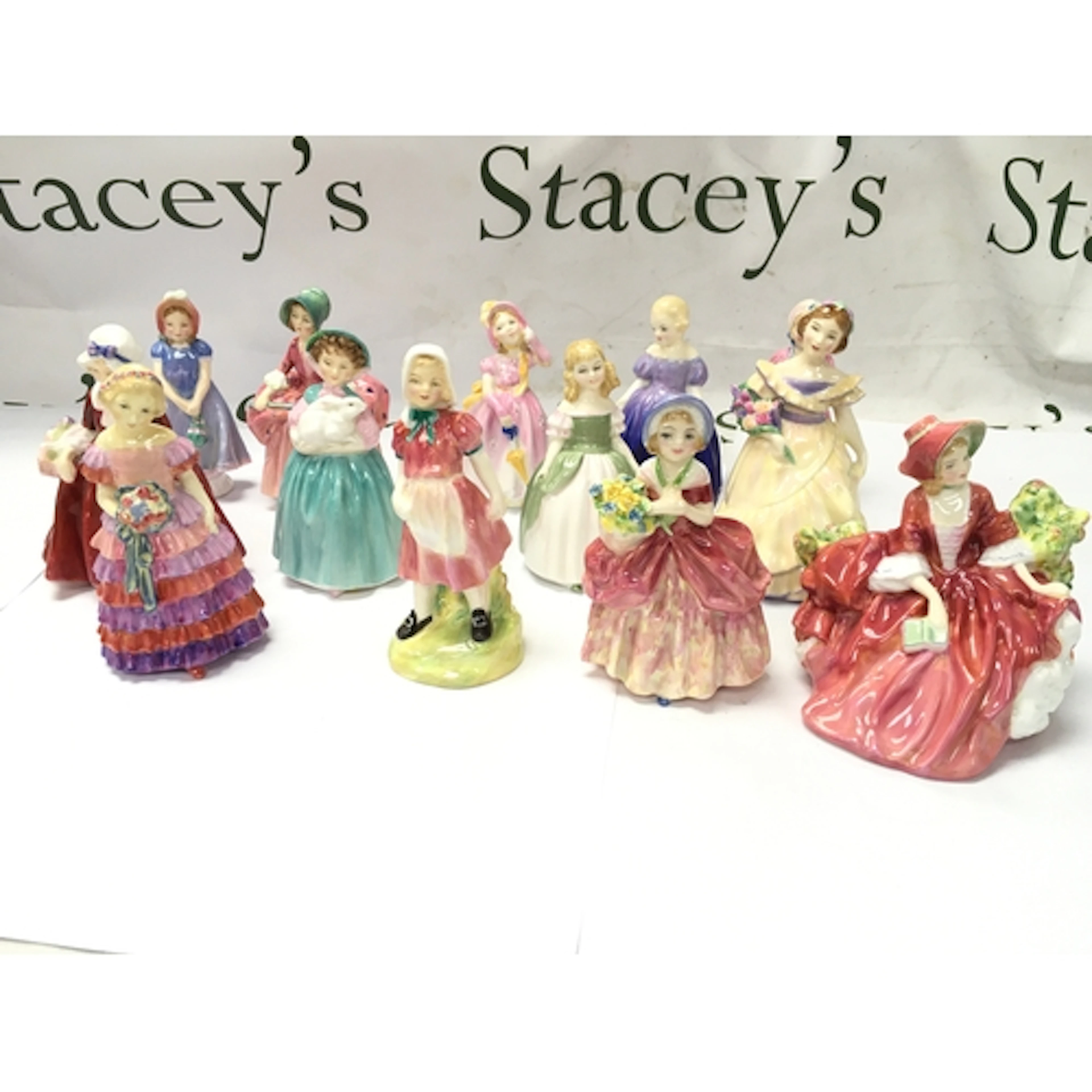 Porcelain lady and child figurines, Royal Doulton pieces suc...