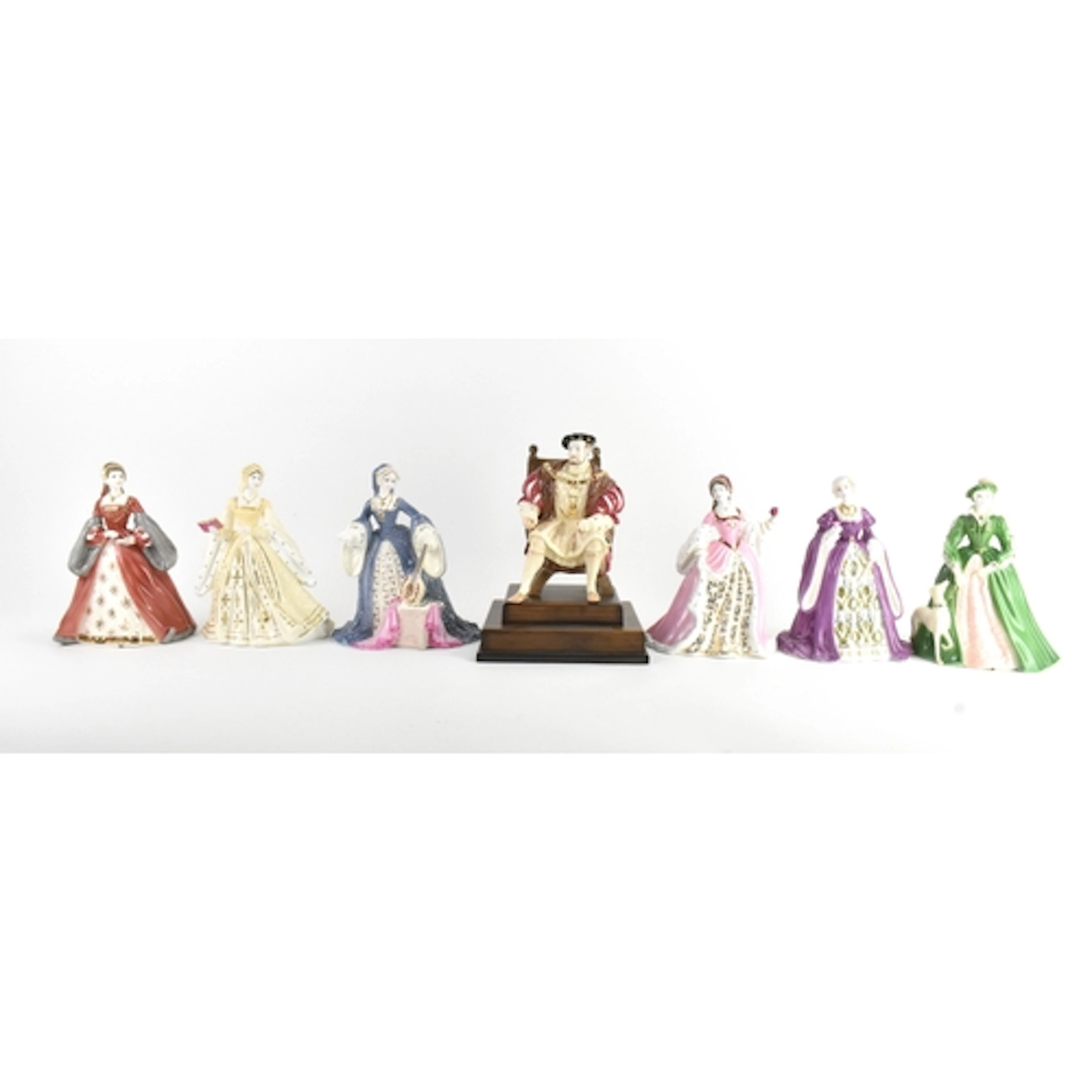 A set of seven Wedgwood porcelain figures of Henry VIII and ...