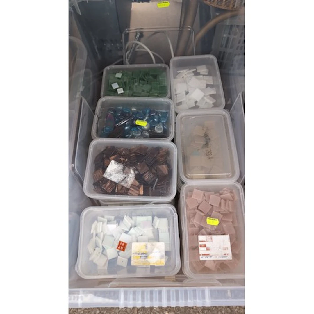 A quantity of mosaic-making materials in plastic containers,...